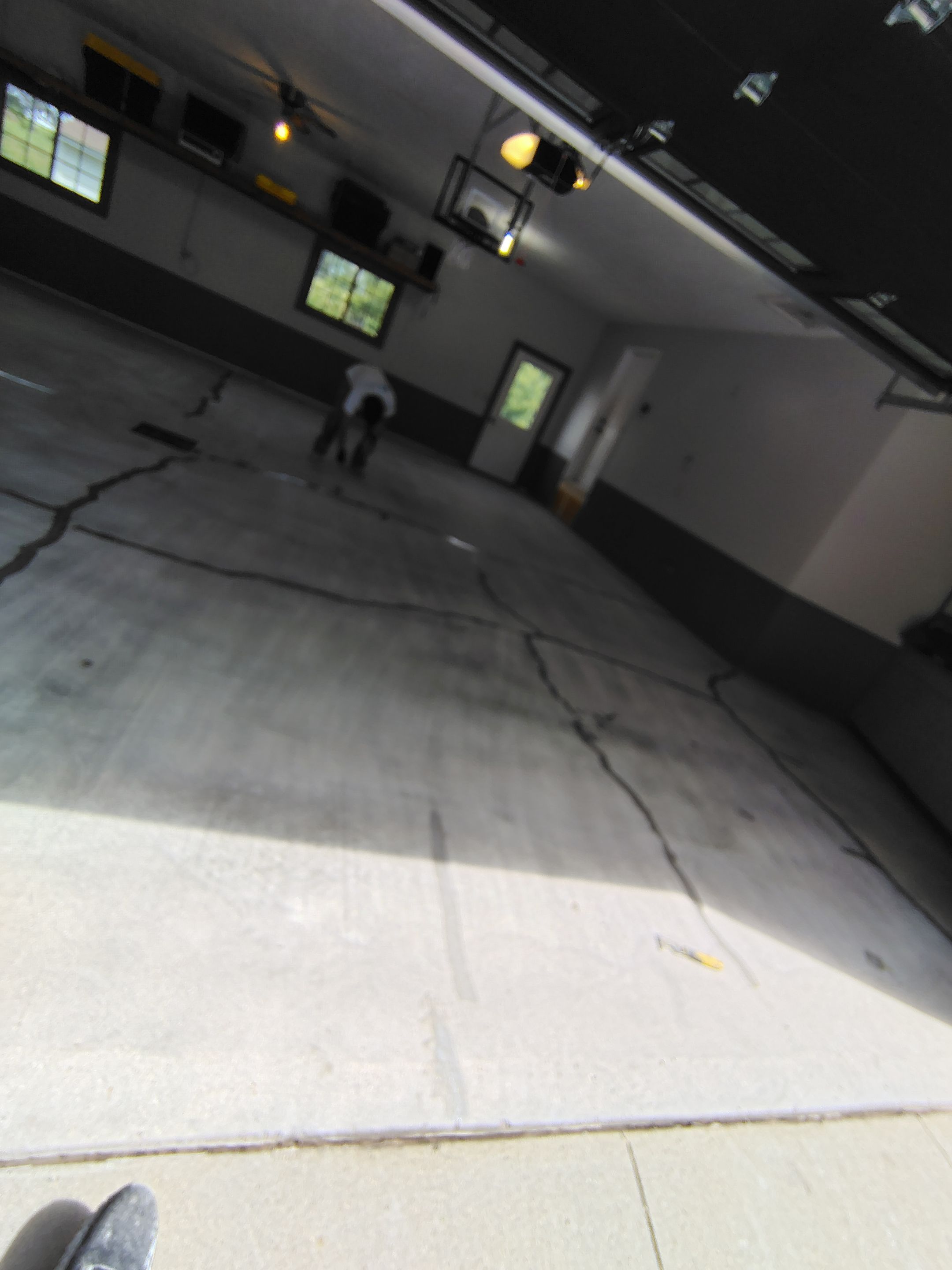 Multi-Fleck Epoxy Garage Floor Coating in Dell Rapids by Select Painting, Coatings & Garage Cabinets