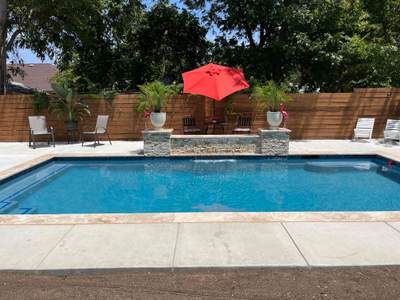 Geometric Pool with Tanning Ledge and Flagstone Decking