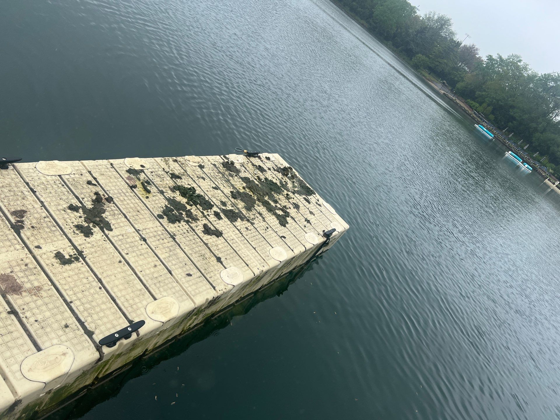 Power washing of floating dock by Northern Power Washing LLC.
