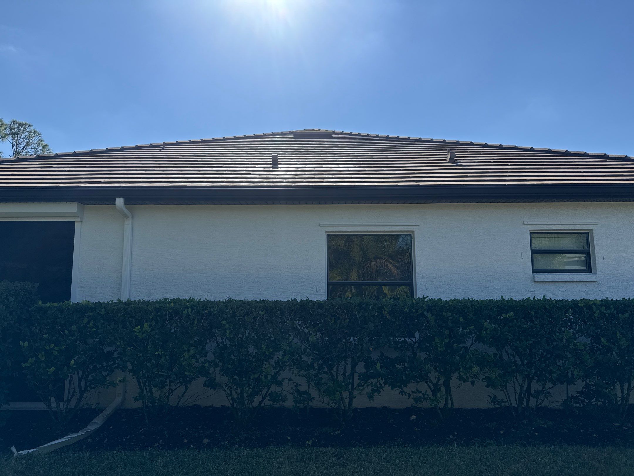 Flat Tile Roof, Paver Pool Deck & Driveway Cleaning | Cove at Twin Rivers, Parrish FL by Sunshine AquaWash