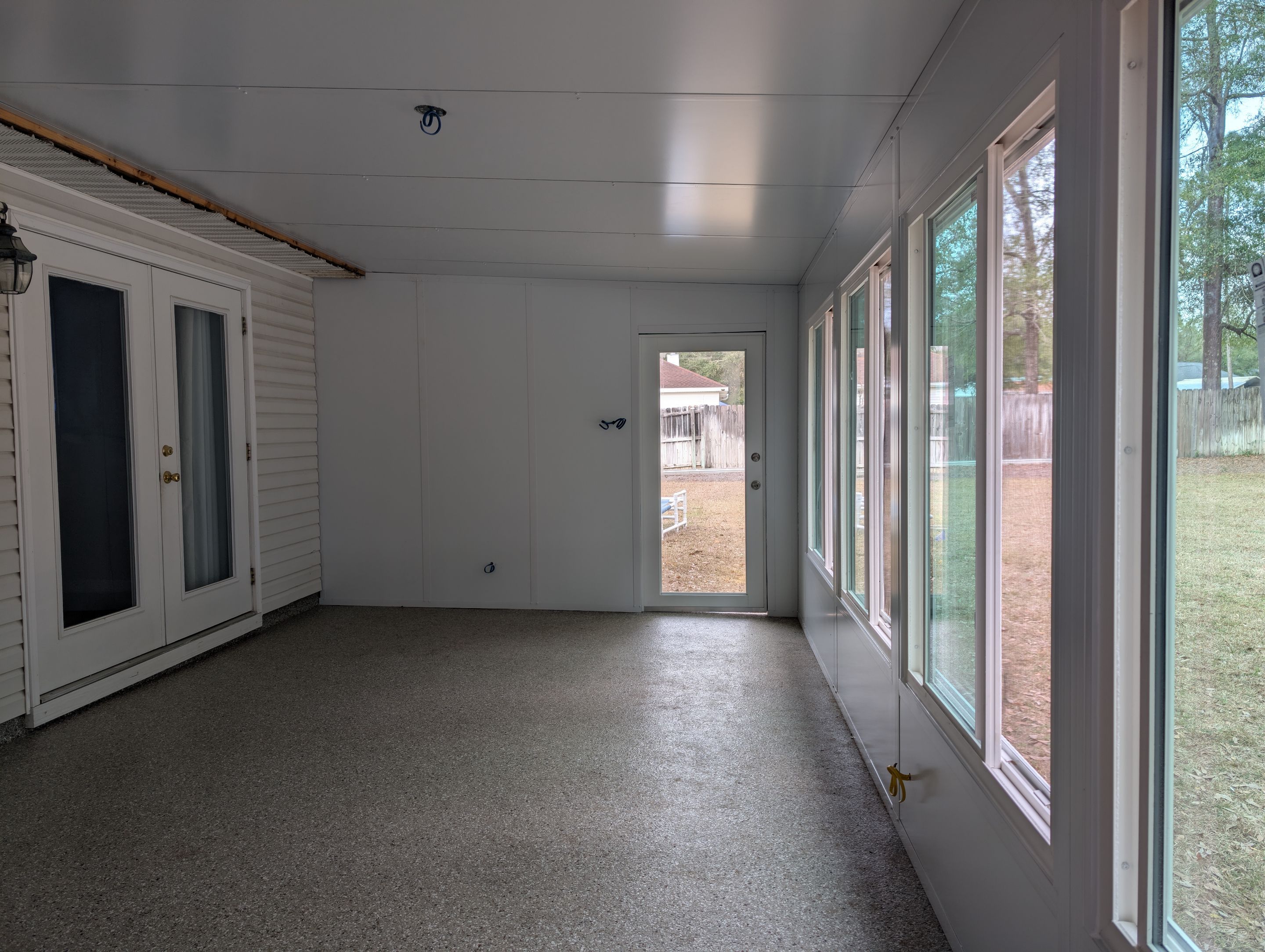 Large Divided Glass Room with Patio cover by Titan Sunrooms