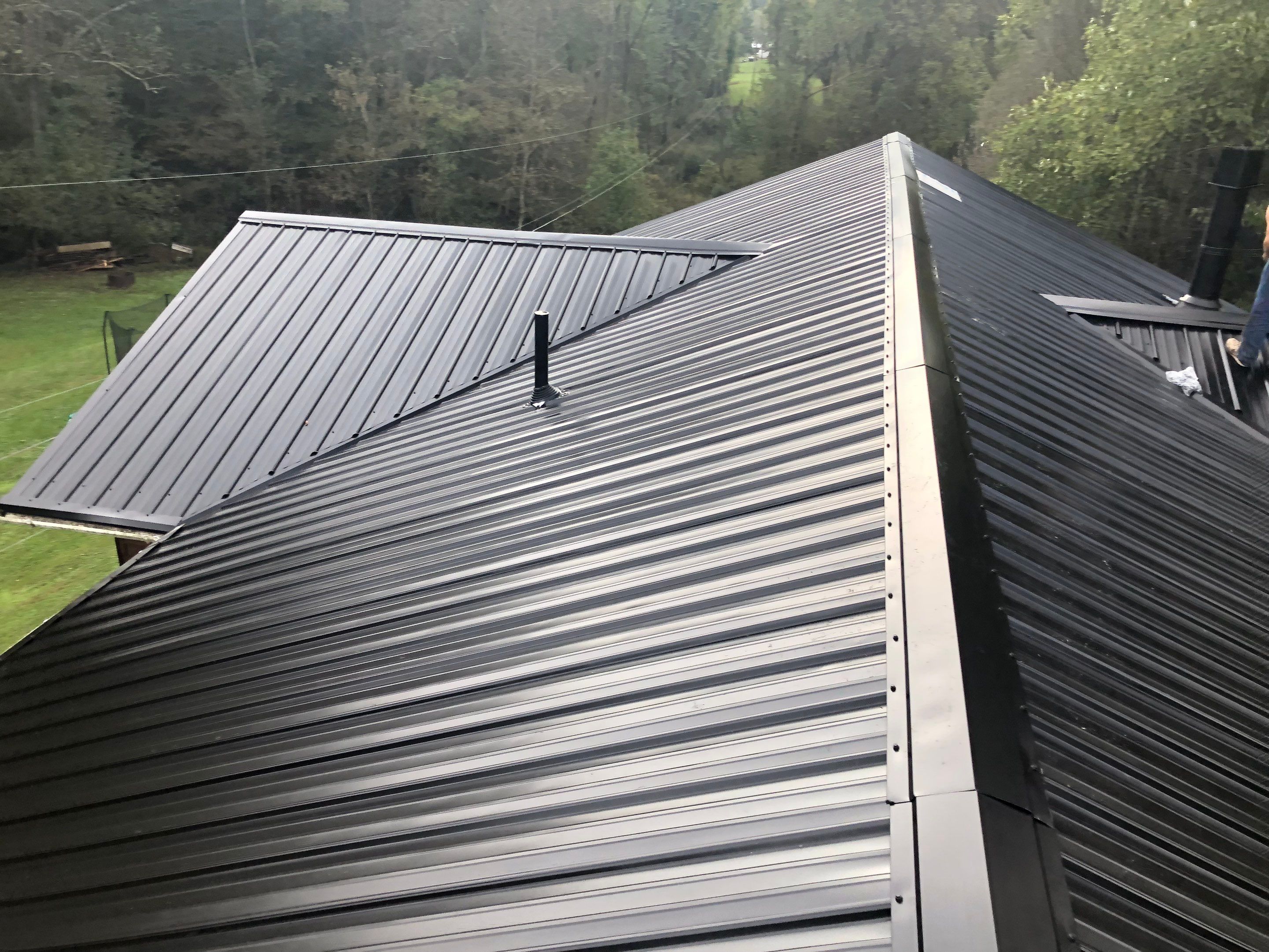 Metal Roof and Vinyl Siding, Soffit, Gutters using LifeTite Premium metal roofing  by Secure Construction Company Inc