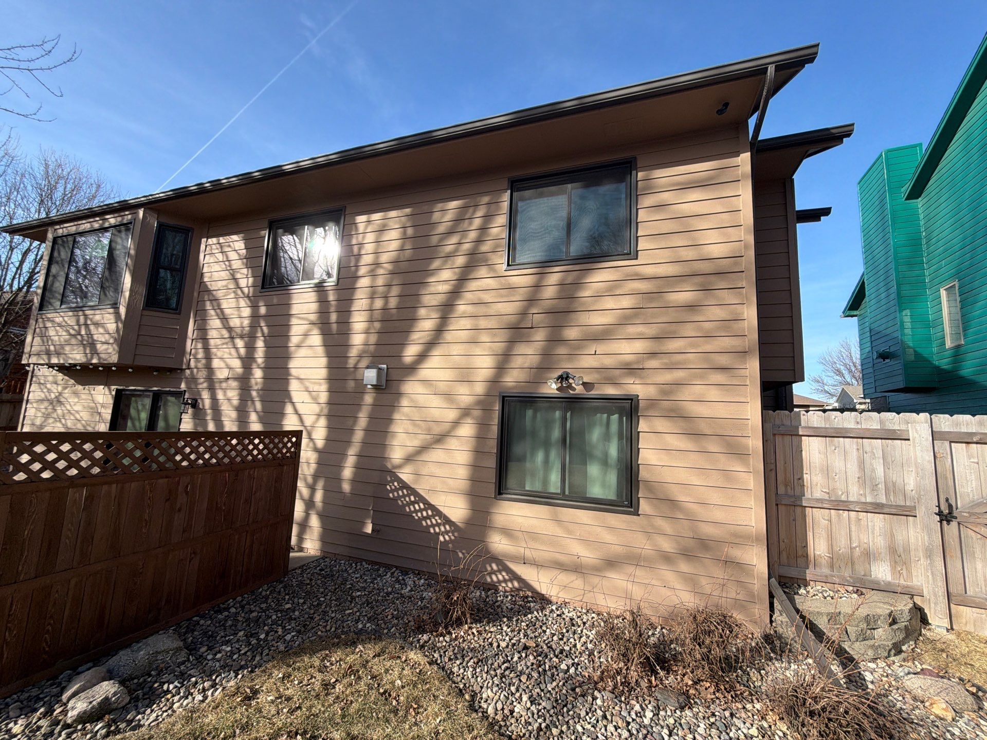 Wood Siding Restoration and Exterior Painting in Sioux Falls by Select Painting, Coatings & Garage Cabinets