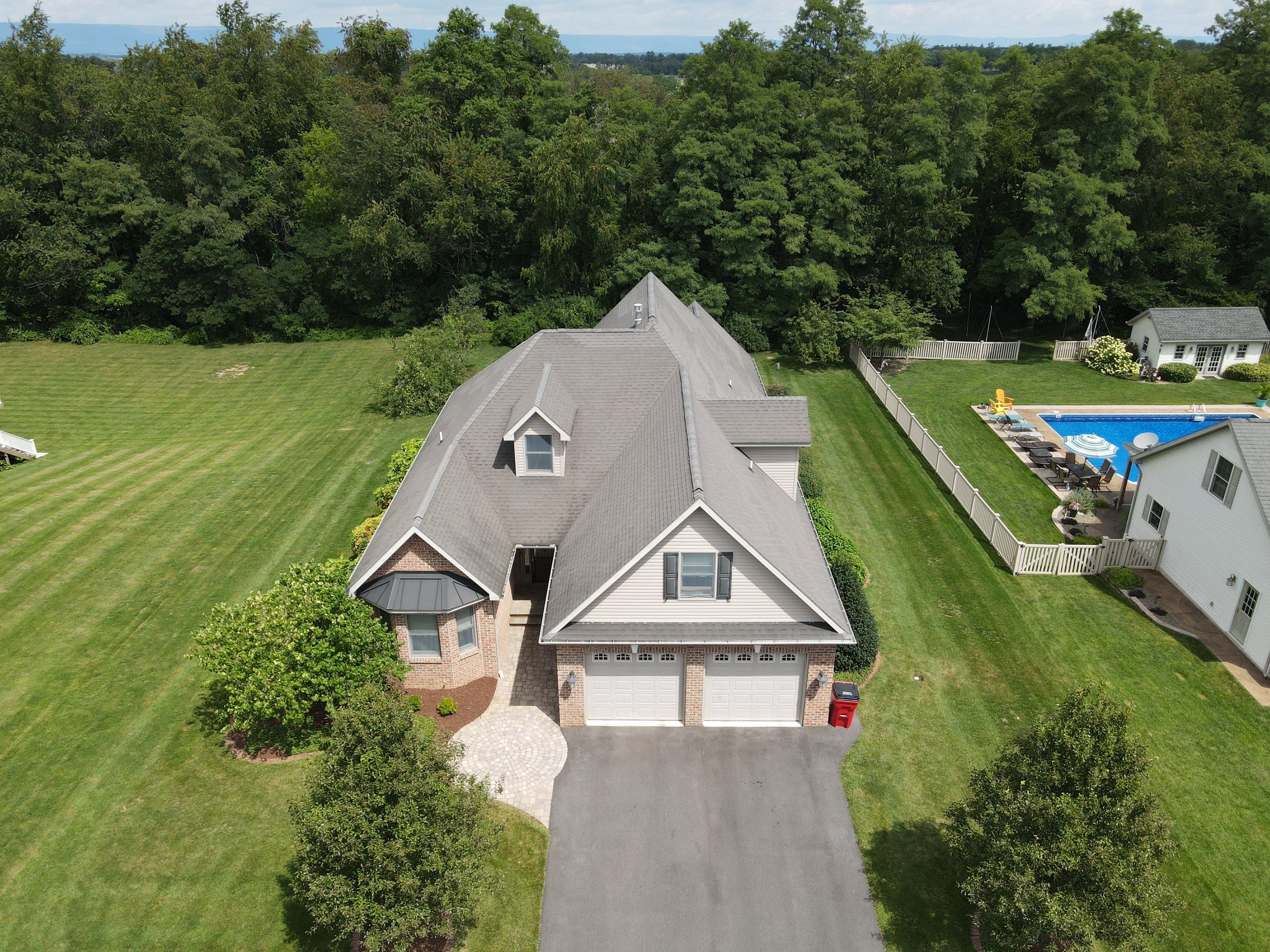 Standing seam / Azm panel in black  by Teflon Roofing