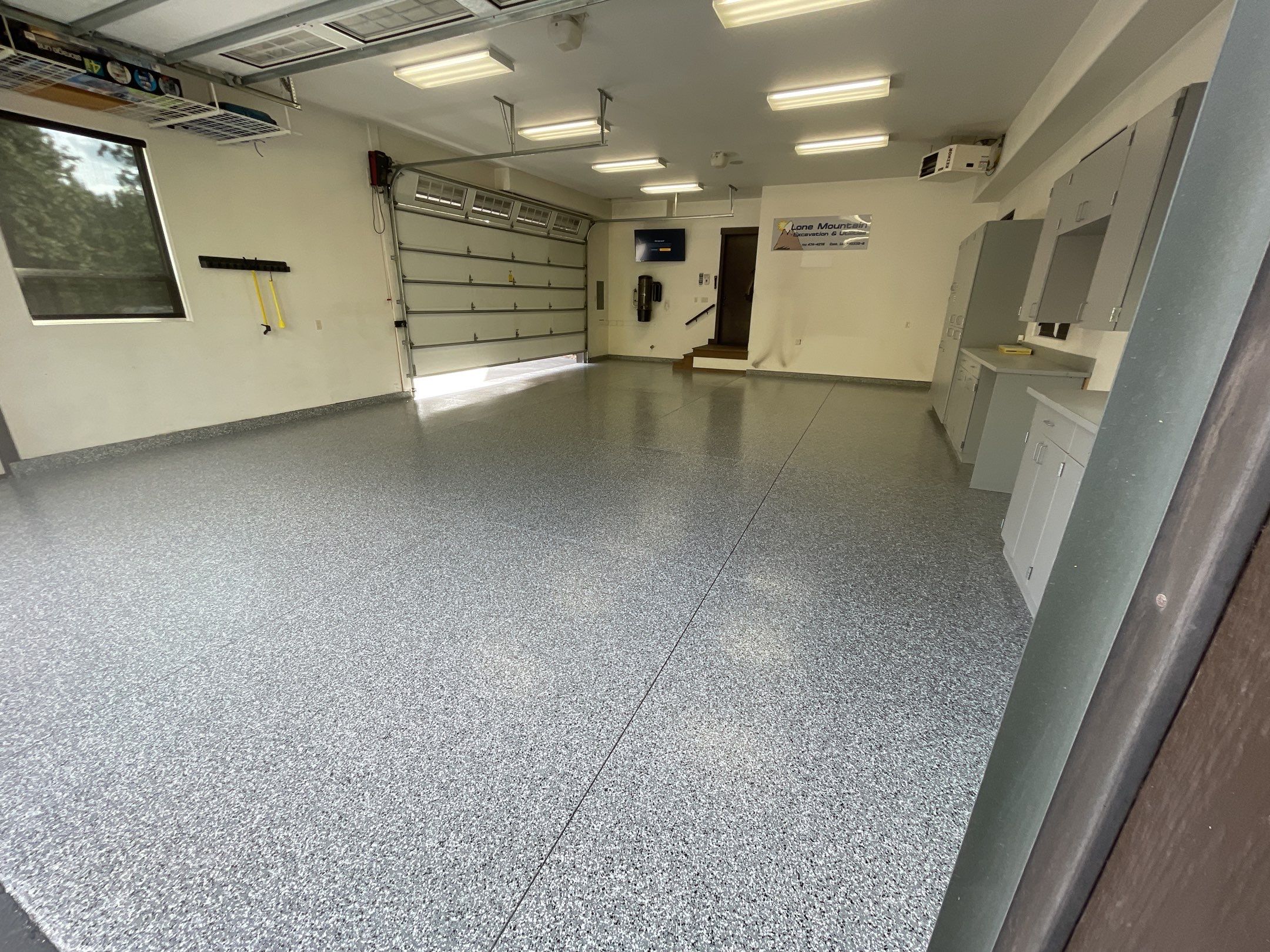 Garage Transformation using Smoke and the Penntek Evolution System by Croc Coatings, LLC