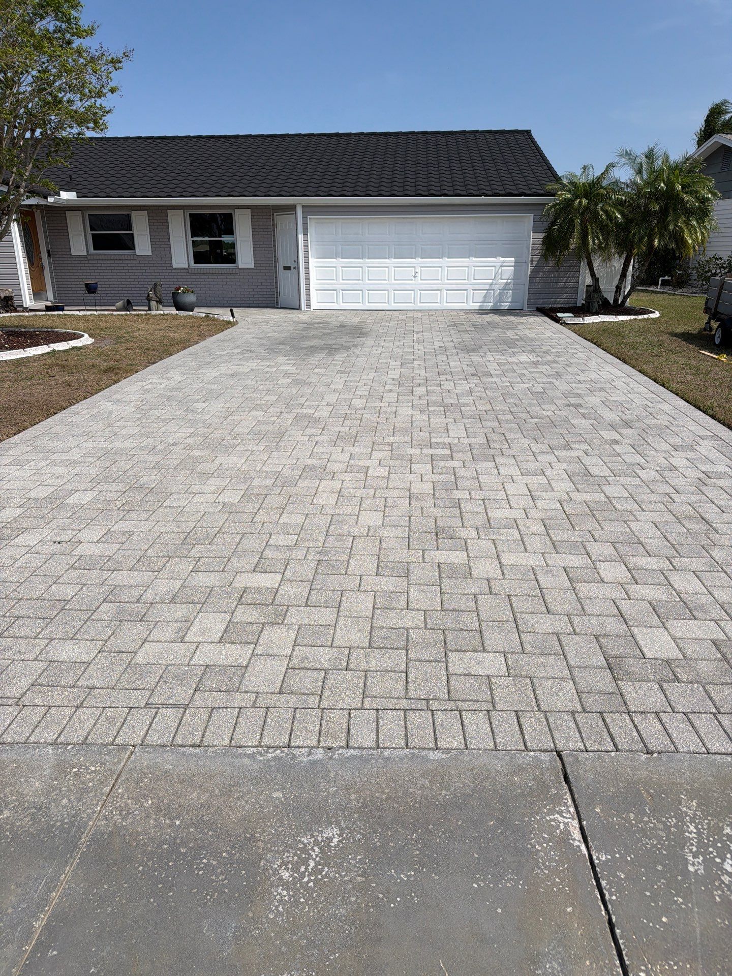 Paver Sealing and Restoration for Sun City Center Driveway by Supreme Paver Experts