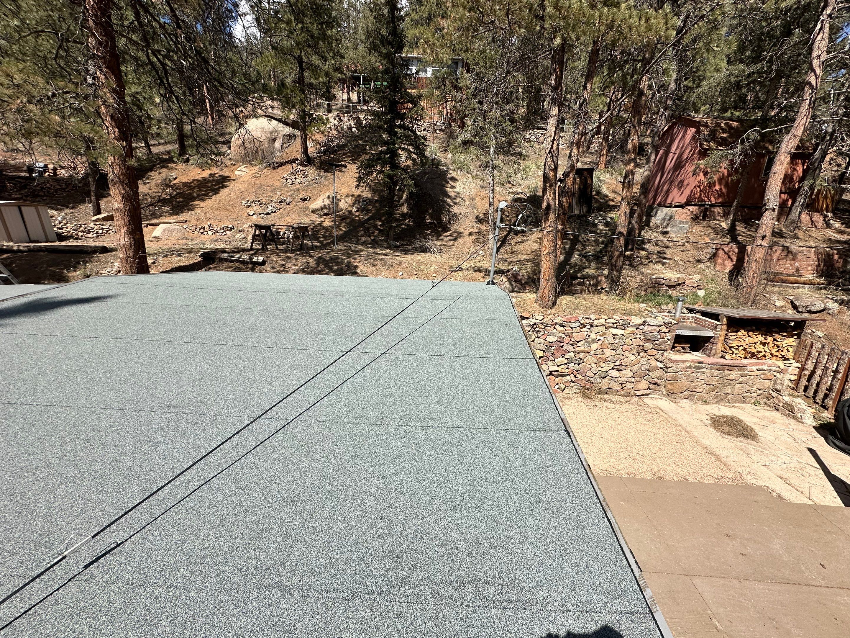 Residential Roofing Installation using Modified Bitumen Roofing by Blue Peaks Roofing LLC 