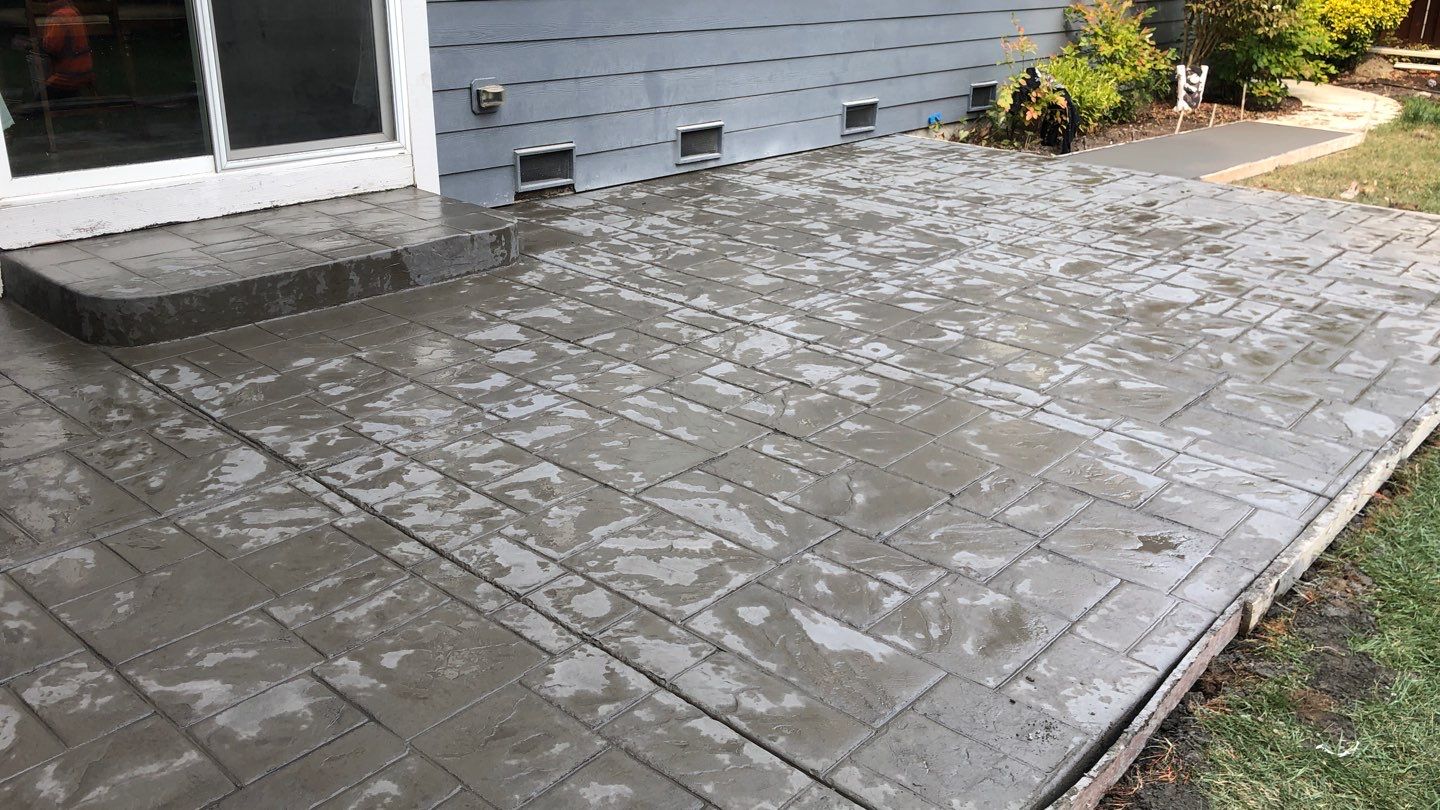  Amy | Stamped Finish Patio, Concrete Project by Jireh Asphalt & Concrete Inc 