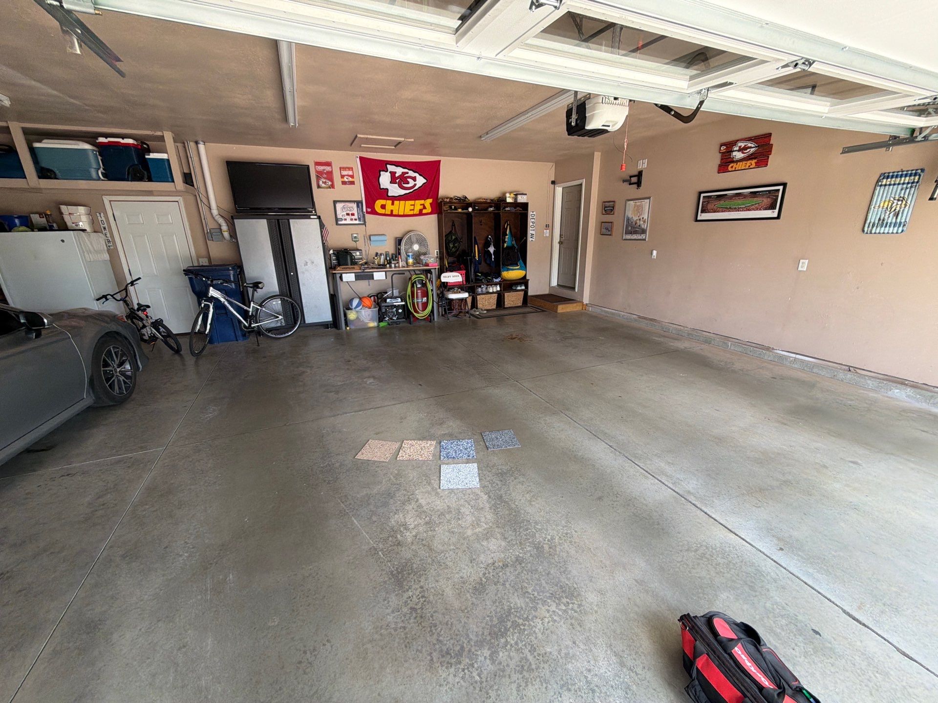 Multi-Car Garage Floor Coating and Crack Repair in Tea by Select Painting, Coatings & Garage Cabinets