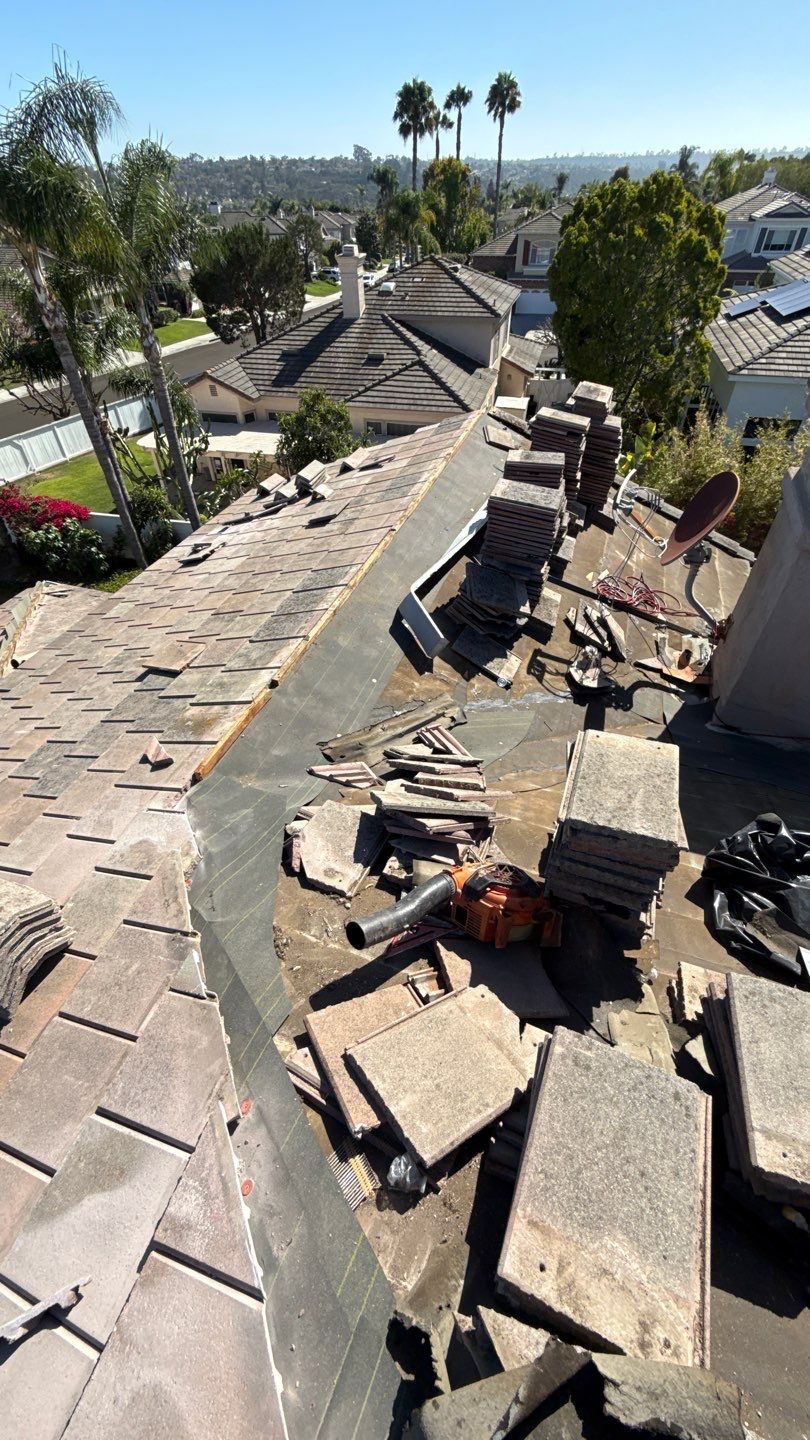 Carlsbad Concrete Tile Roof Replacement with Copper Flashing and Skylights by Reliable Roofing San Diego Inc.