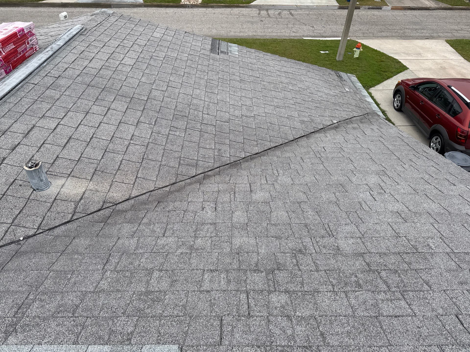 Onyx Black Shingles by Reimagine Roofing