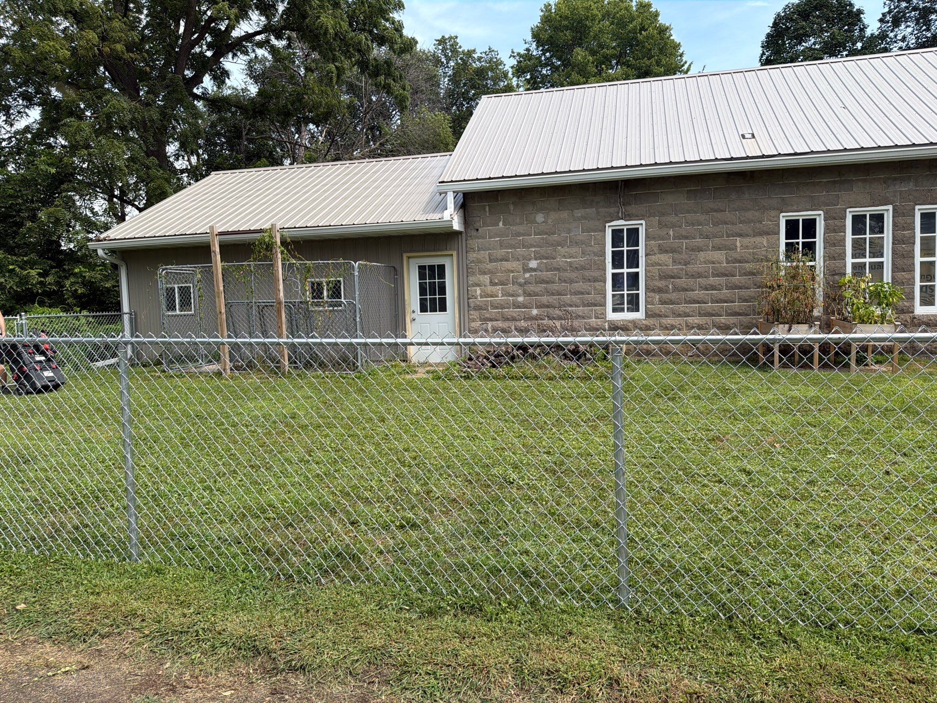 Galvanized Chain Link Fence and Gate Installation in La Porte City by Perfect Picket Fence and Stain