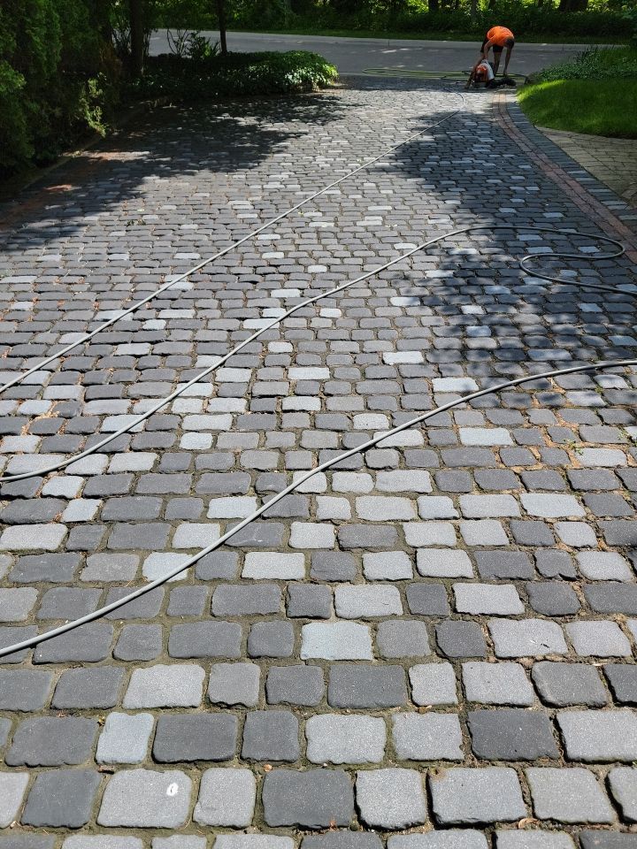 Glencoe, IL brick paver clean sand seal, repair, and reseal by Northern Power Washing LLC.