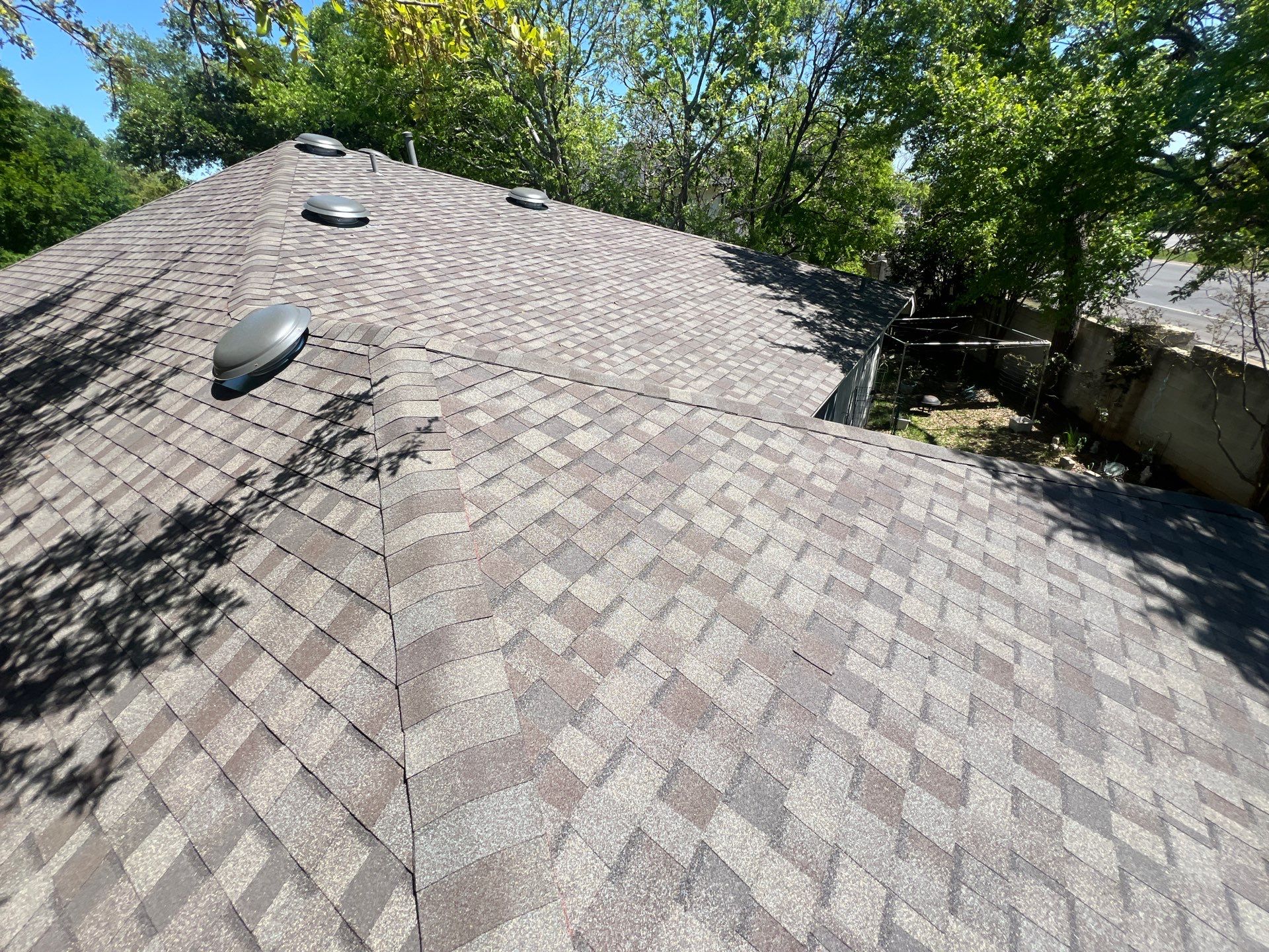 Rental property upgrade using CertainTeed Landmark shingles. by Oakwood Roofing and Construction, LLC