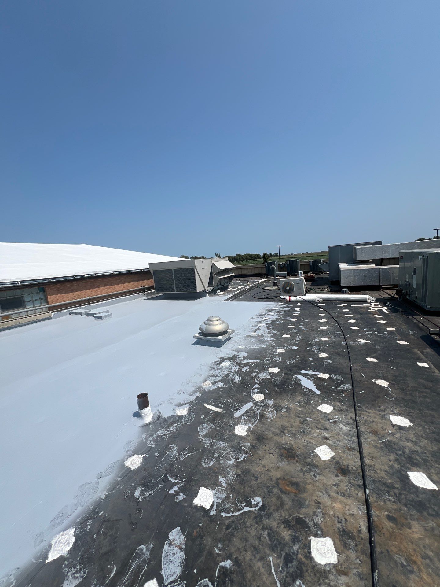 Single-Ply Roofing System – Aquinas Catholic School by Tillotson Enterprises