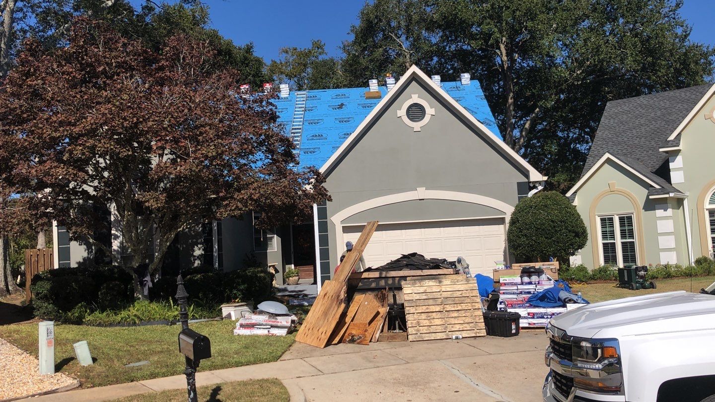 Residential Roofing Installation using Roof Replacement by American Roofing & Construction LLC