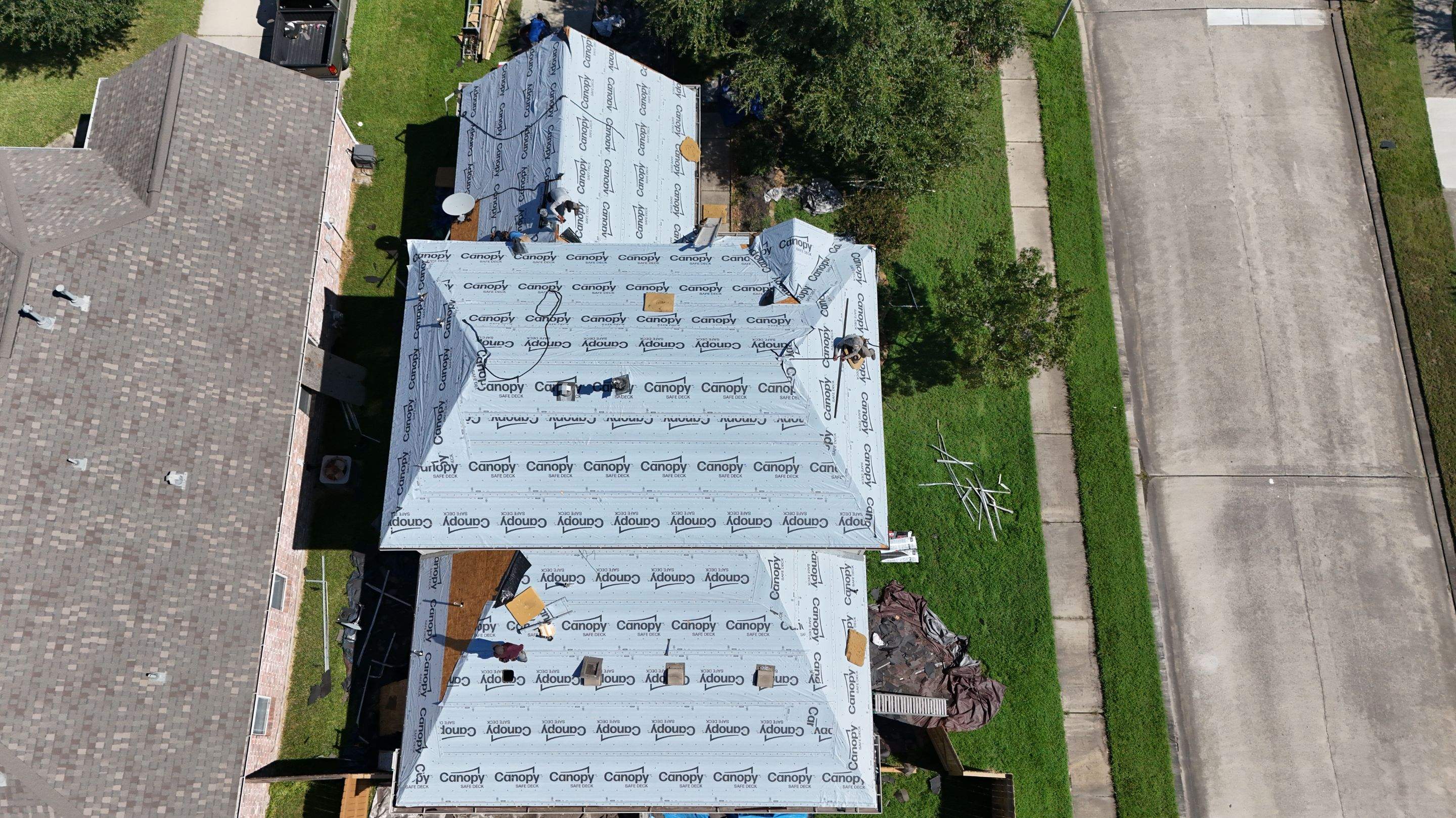 Full Roof Replacement in Warm Brown Tones — Spring, TX by PL Roofing & SB Roofing, LLC.