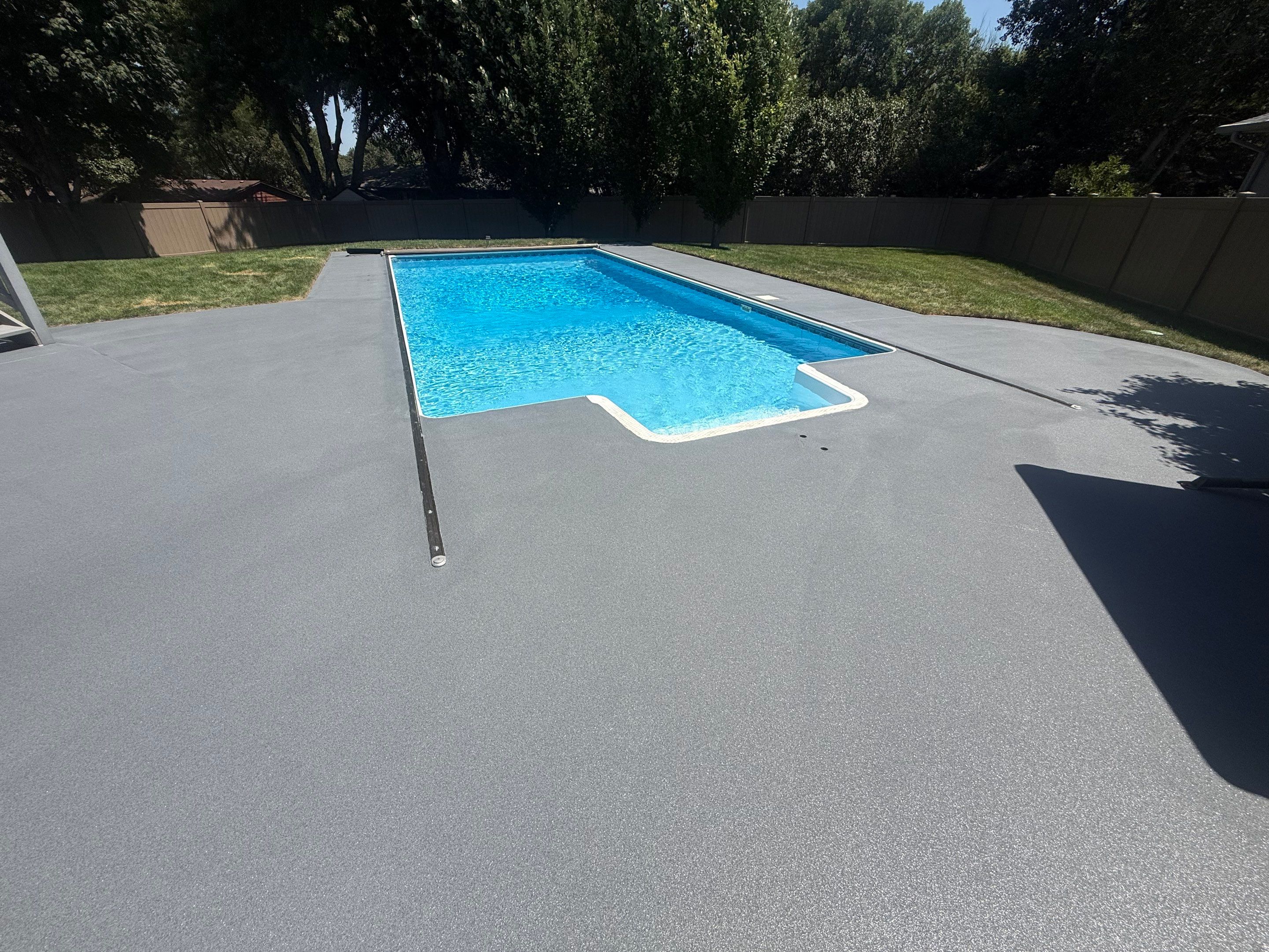 Residential Pool Deck Resurfacing in Sioux Falls by Select Painting, Coatings & Garage Cabinets
