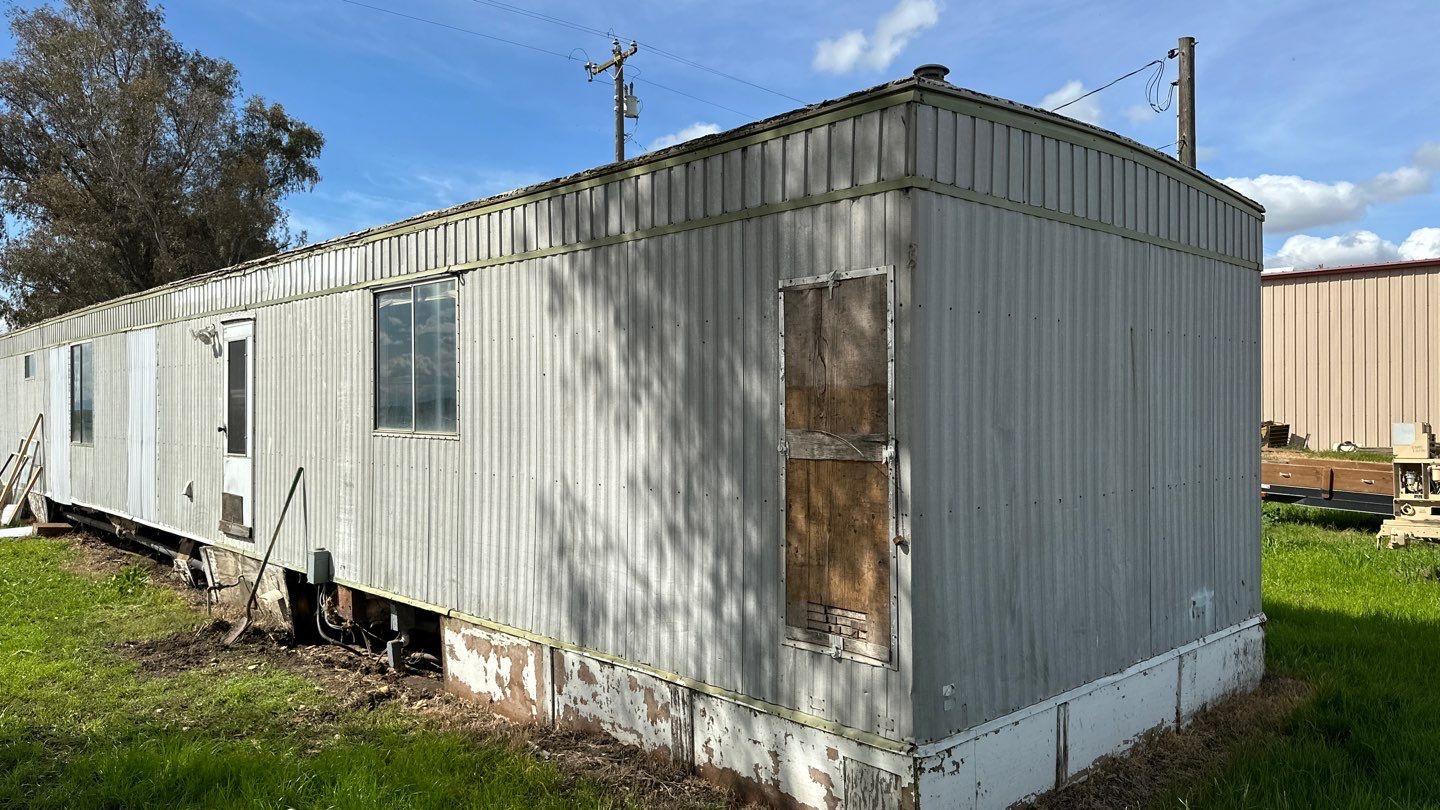 Foam and coatings on mobile home by Straight Edge Roofing Inc