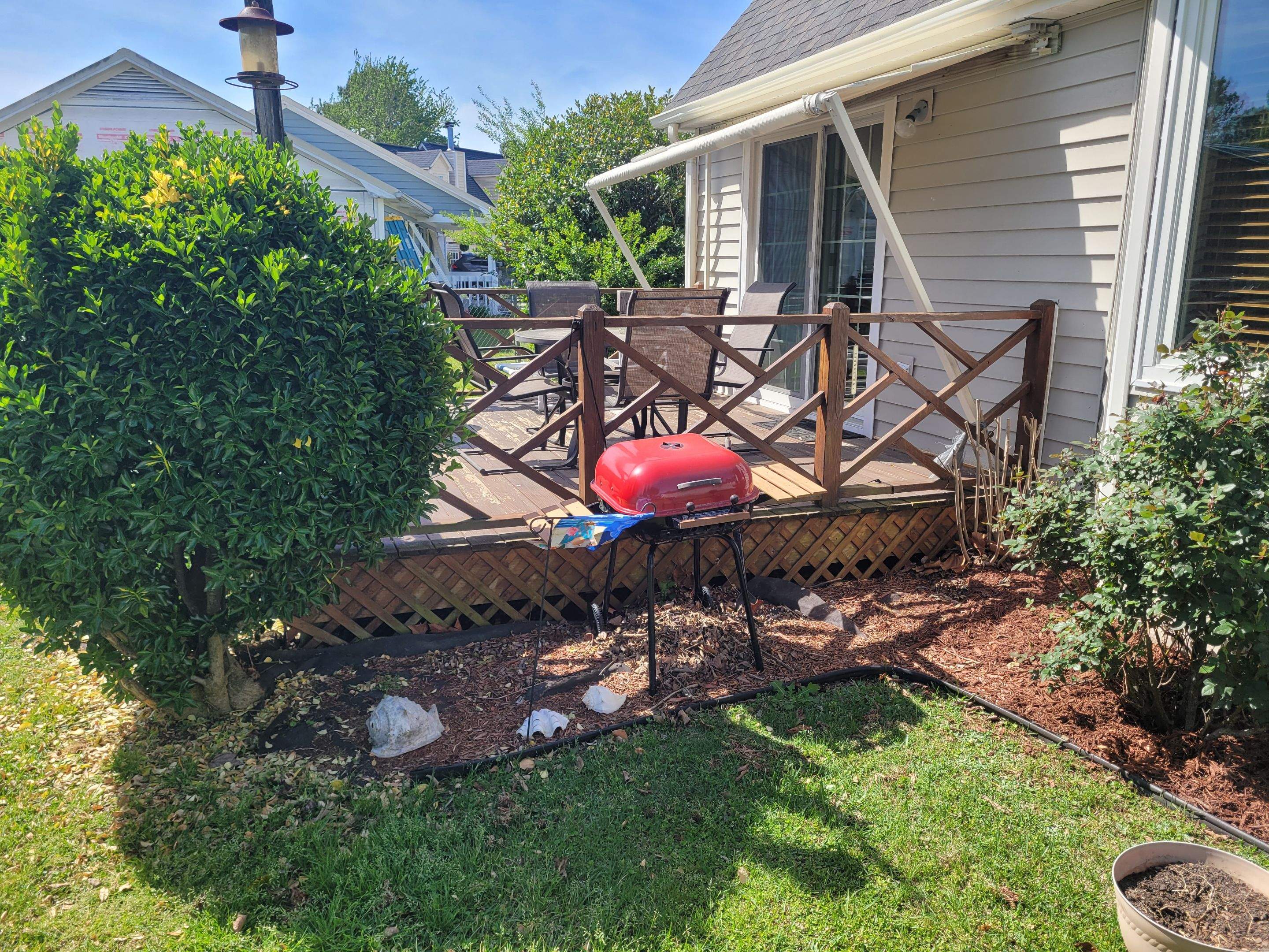 Pressure-Treated Wood Deck Resurface and Railing Upgrade in Havelock by The Remodeling Company