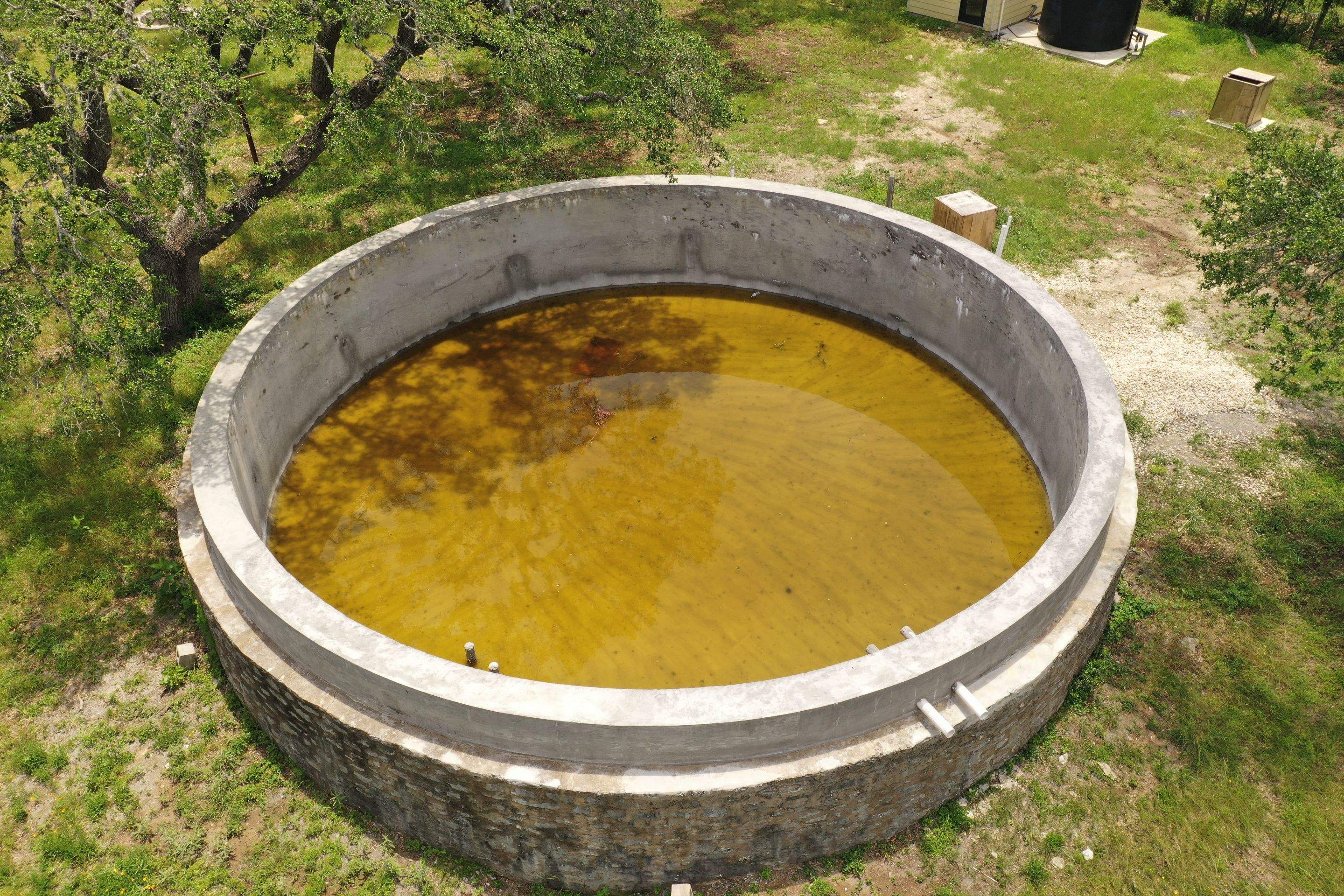 Restoration of 65k gallon Cattle Watering Tank by Hill Country Rain Water