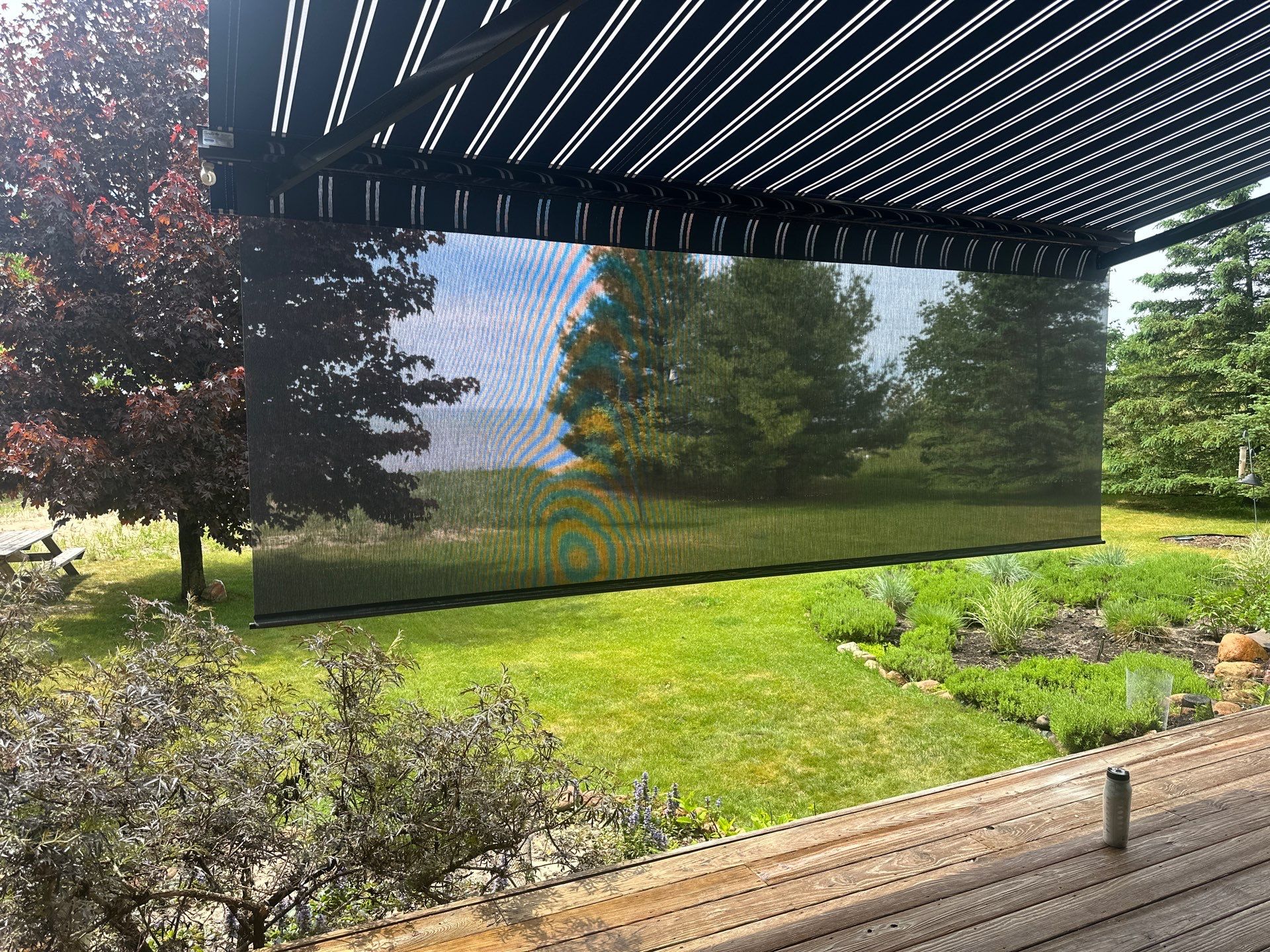 Sunesta Retractable Awning and Privacy Shade Installation in Ellsworth by Rainbow Seamless Systems