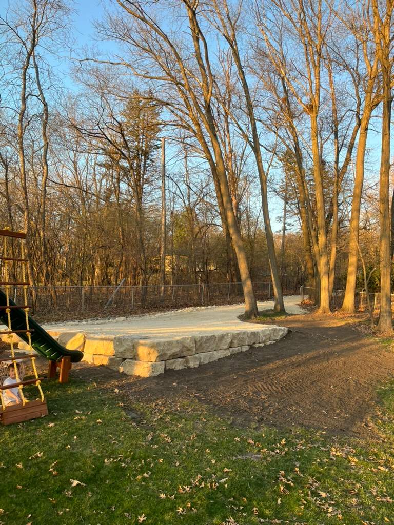 Limestone Boulder Wall  by Sota landscaping