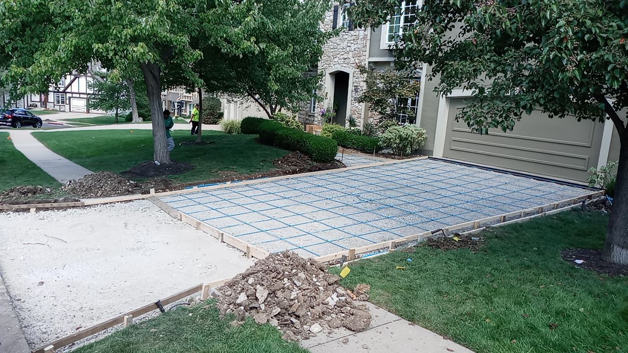 New Driveway and Sidewalk by LAND ESCAPES LLC