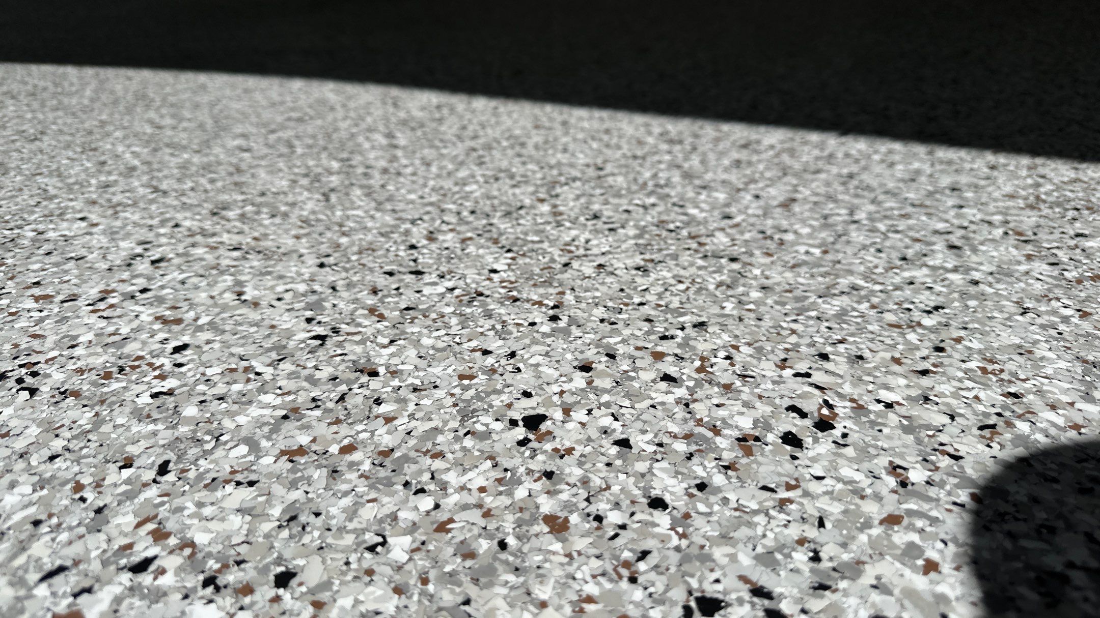 Suzie S. got a new Coyote flake floor  by Banner Garage