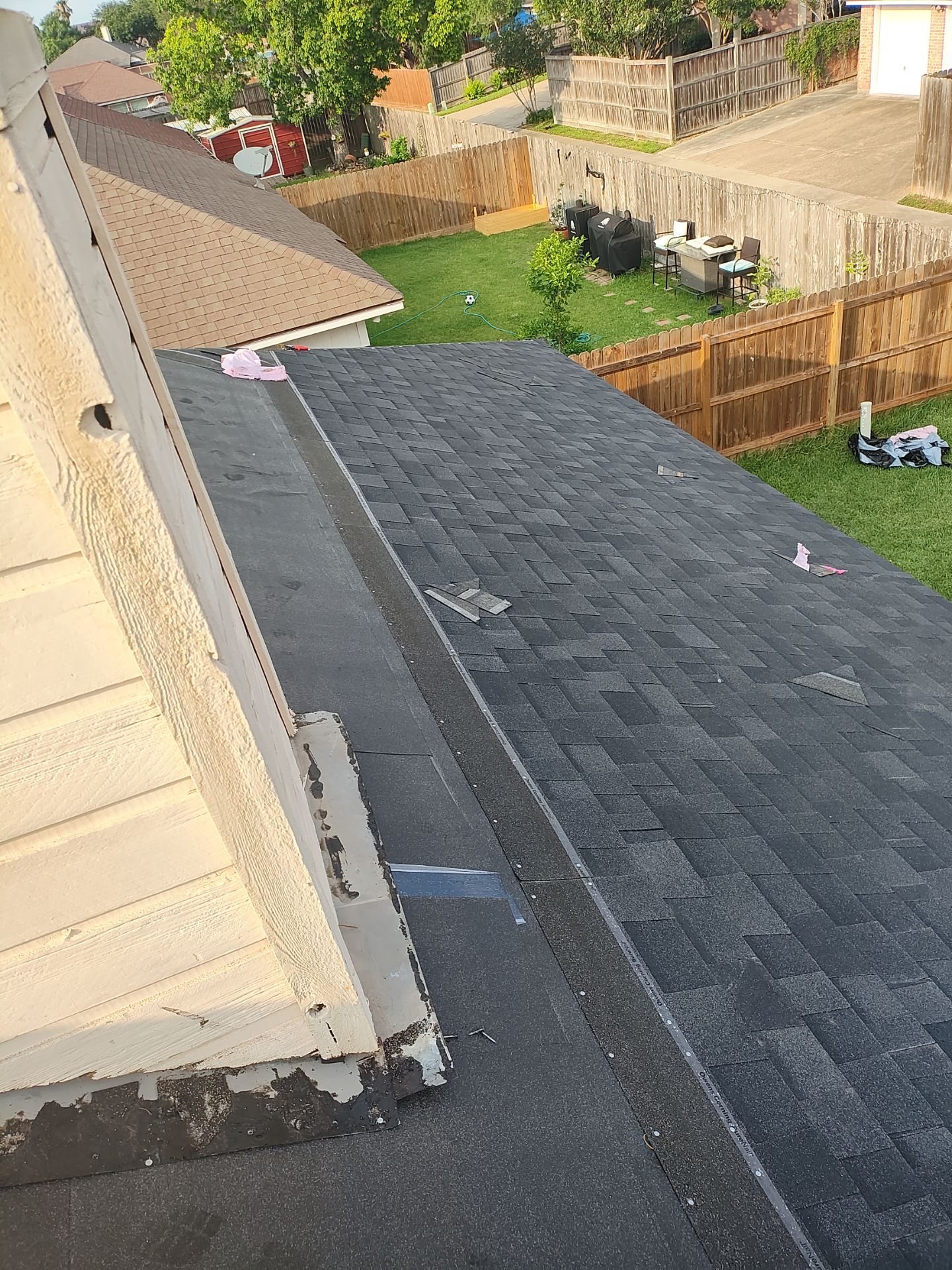 Nothing looks nicer than a little black roof by Bayfront Roofing and Construction
