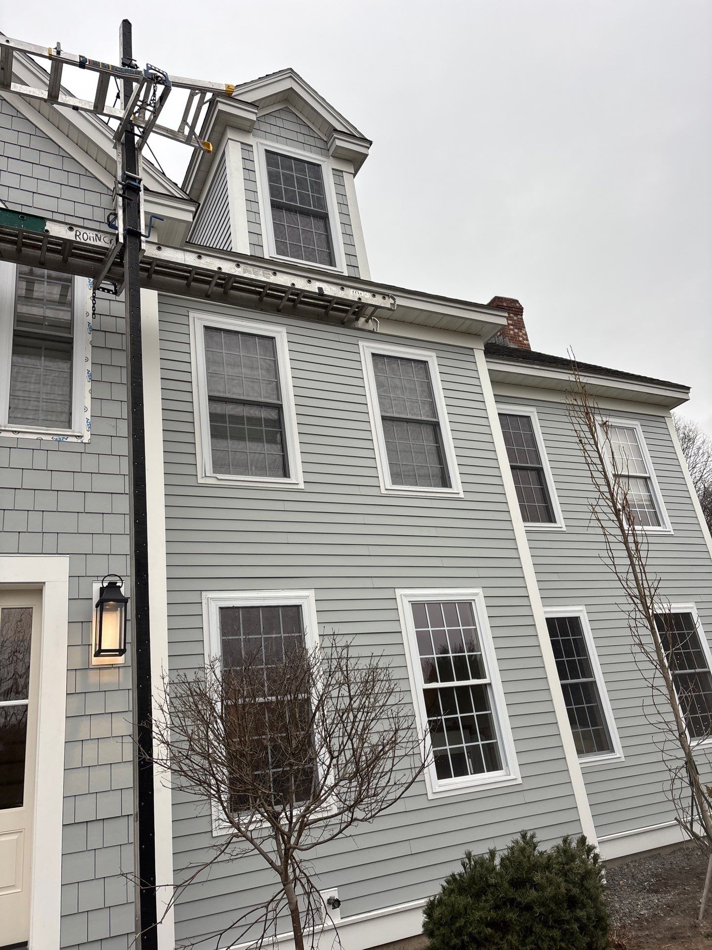 Complete Home Renovation with James Hardie® Clapboard & Shake Siding and Custom PVC Trim by Sensible Home Solutions
