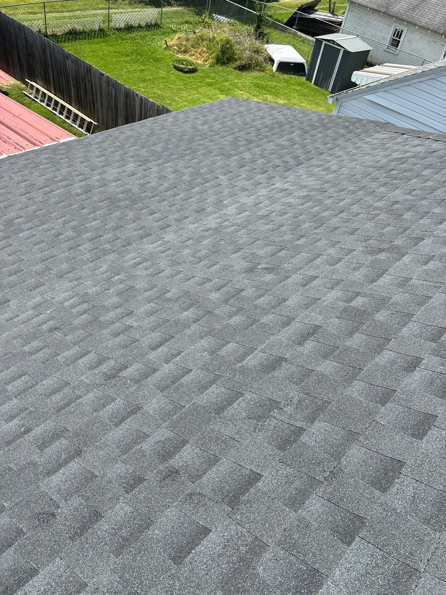 Residential Roofing Installation using GAF Timberline HDZ Charcoal by Rainstoppers Roofing