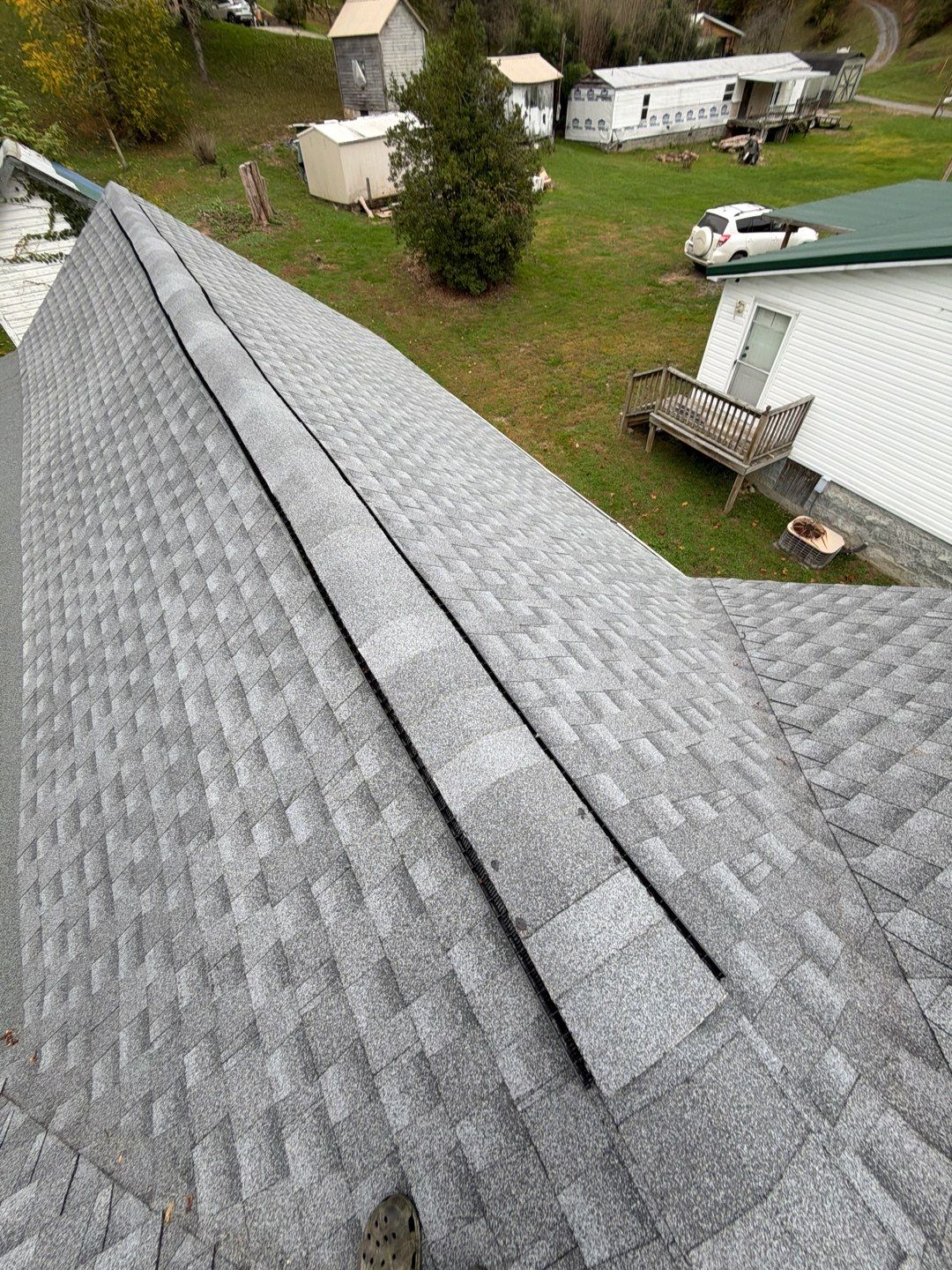 Residential Roofing Installation using GAF Timberline HDZ Oyster Grey by Rainstoppers Roofing