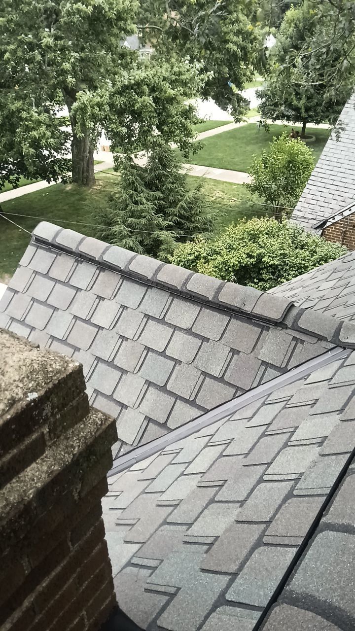 Residential Roofing Installation using Certainteed Belmont shingle by Absolute Roofing and Construction