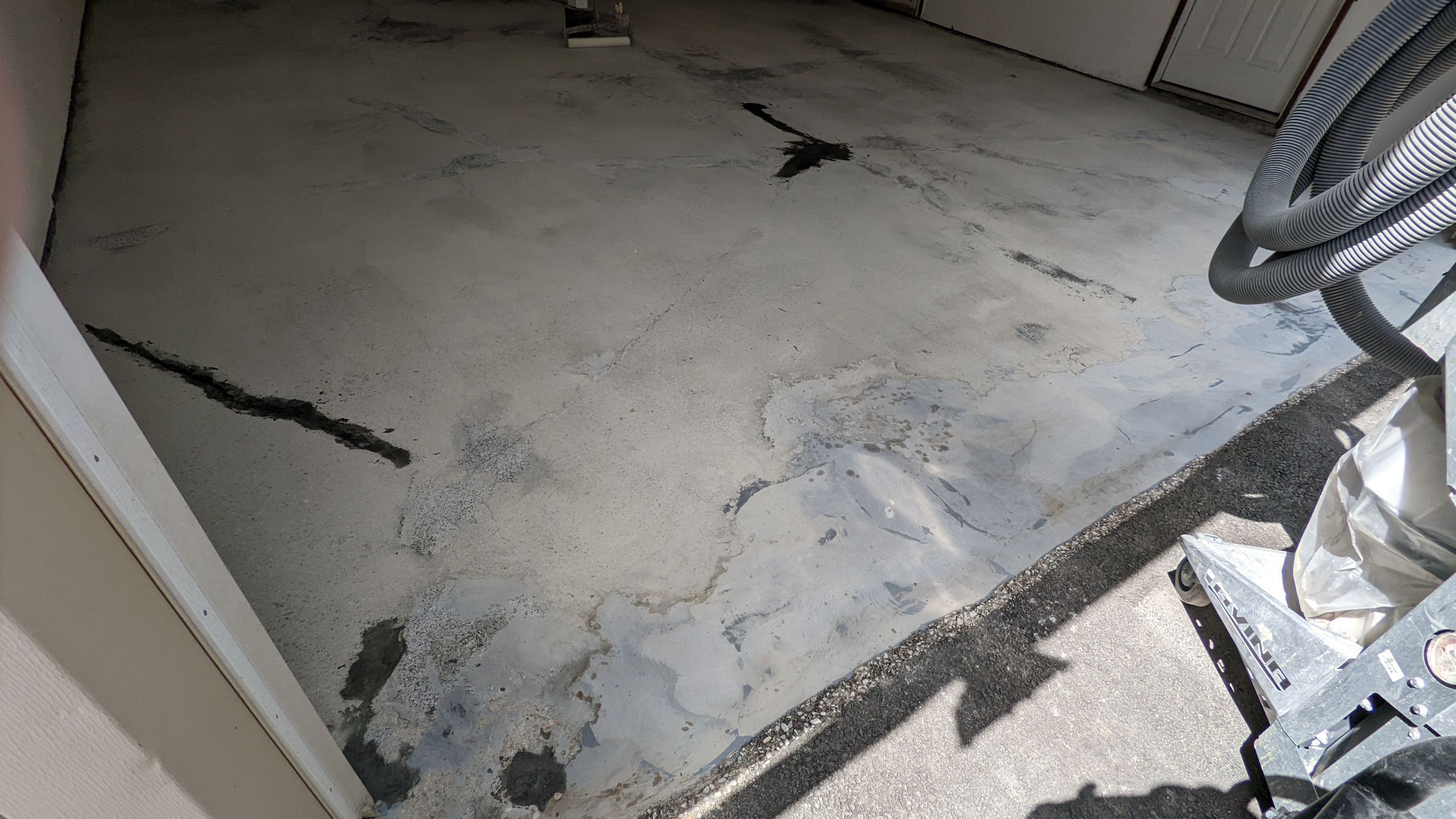Garage Transformation using Domino for Garage and Pecan for Pool Deck by Croc Coatings, LLC