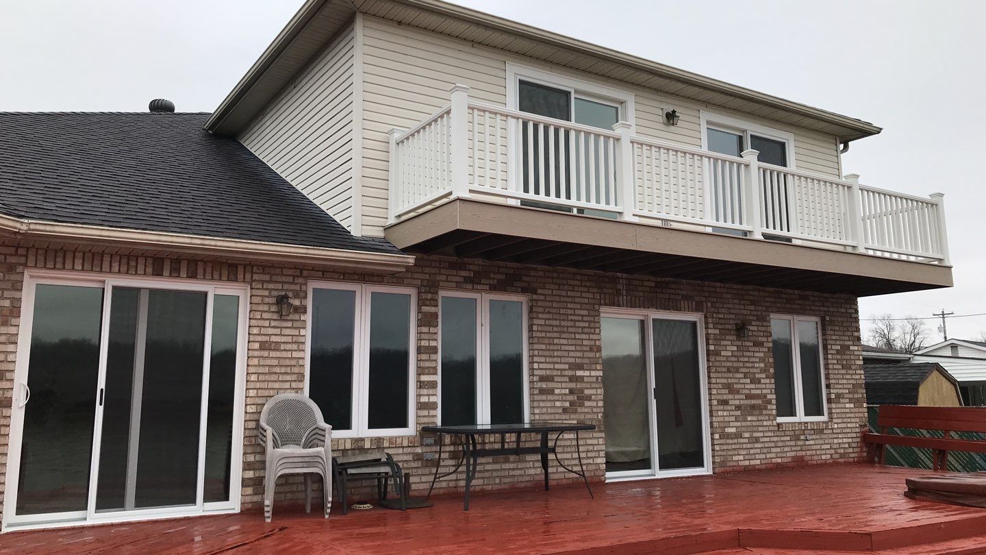 Deck Refurbush and Door Replacement using Trex Decking and Railing. Polaris Patio Doors by Secure Construction Company Inc