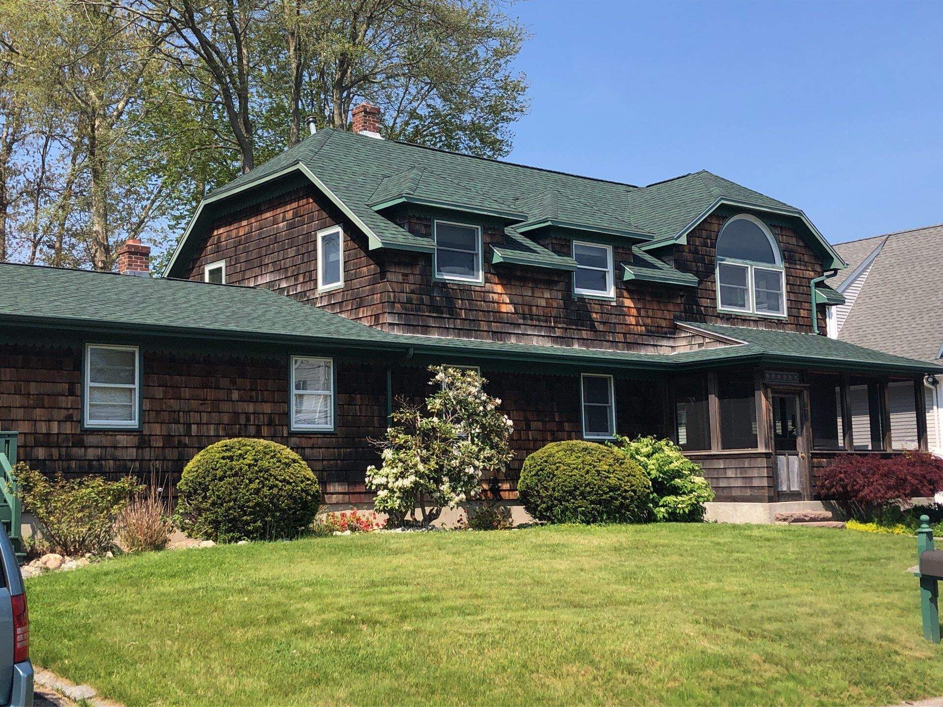 Hunter Green Roofs by Pinnacle Roofing & Skylights