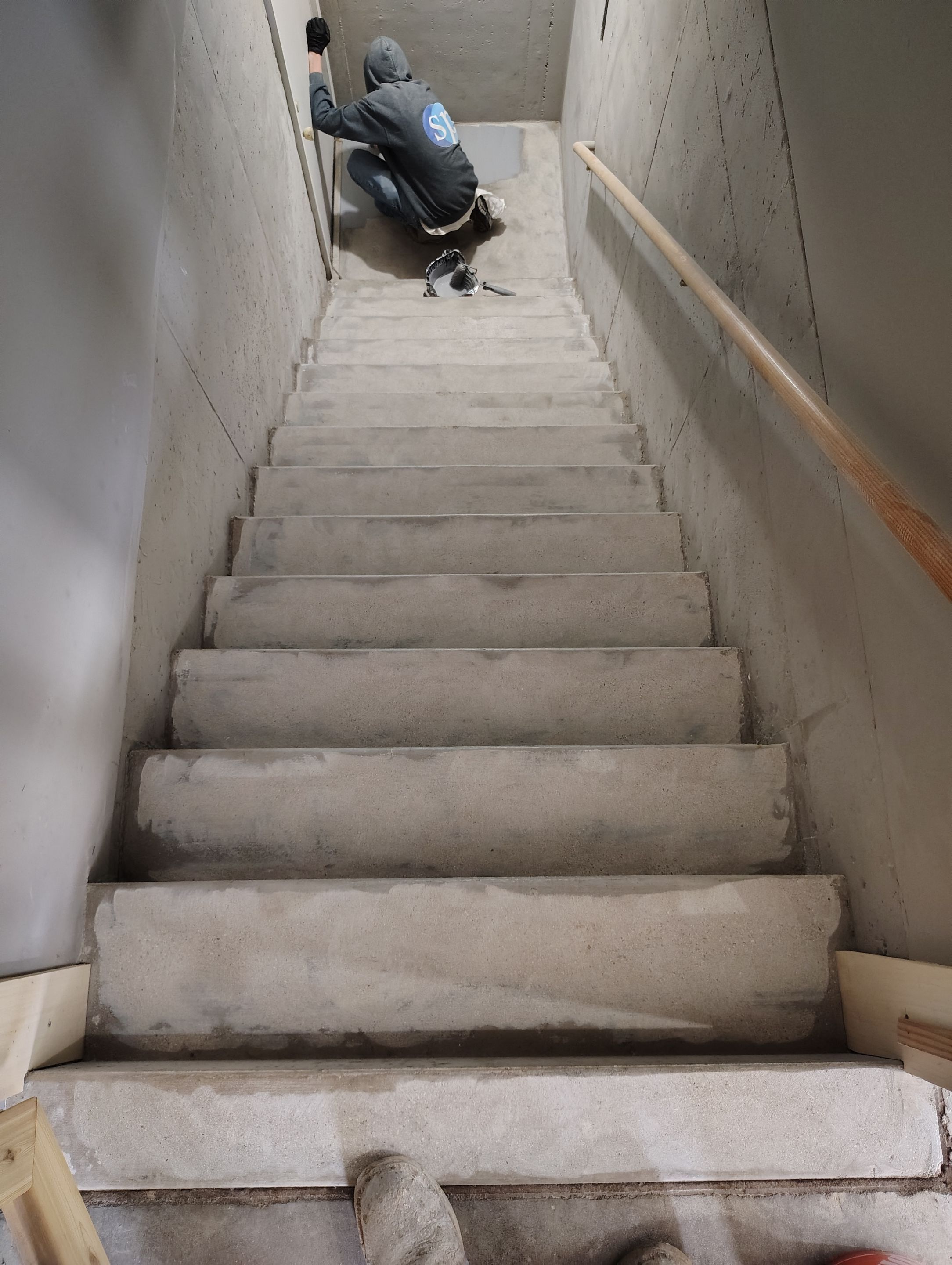Garage Floor Concrete Coating and Crack Repair in Sioux Falls by Select Painting, Coatings & Garage Cabinets