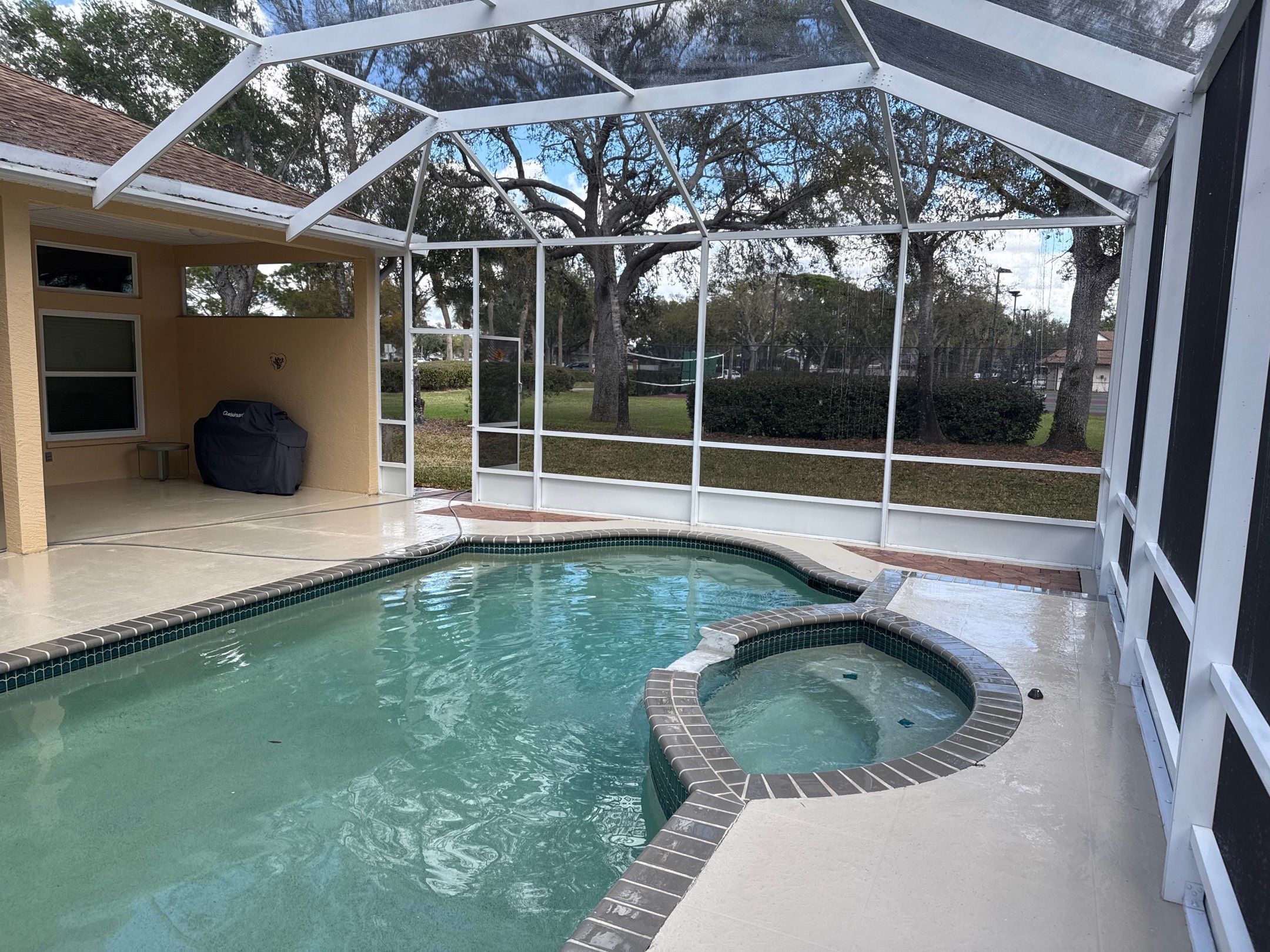 Painted Pool Deck, Pool Cage & Exterior Surface Cleaning in Creekwood – Bradenton, FL by Sunshine AquaWash