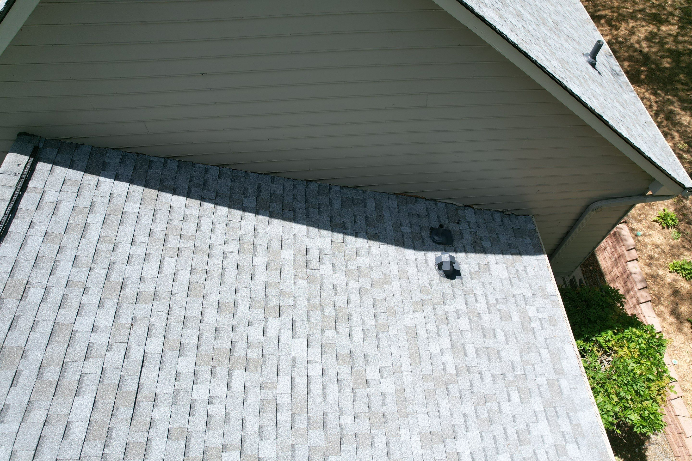 Residential Roofing Installation using Owens Corning Quary Gray by Inspector Roofing and Restoration