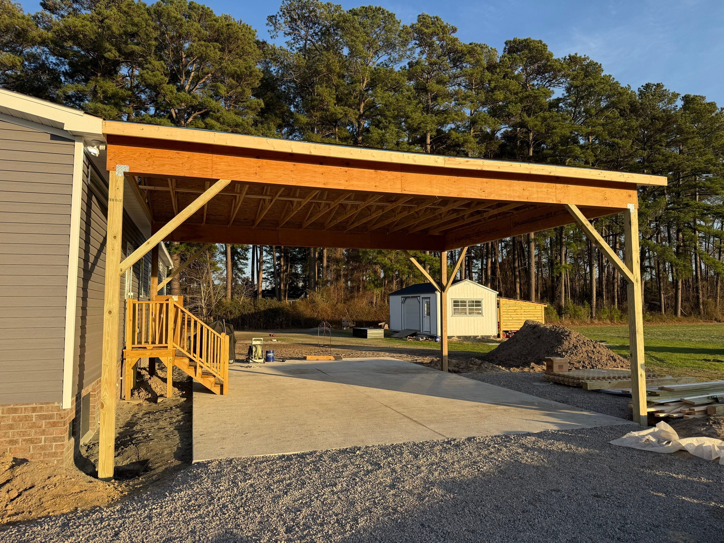 Custom Trex Covered Deck and Gabled Roof in Winterville by The Remodeling Company