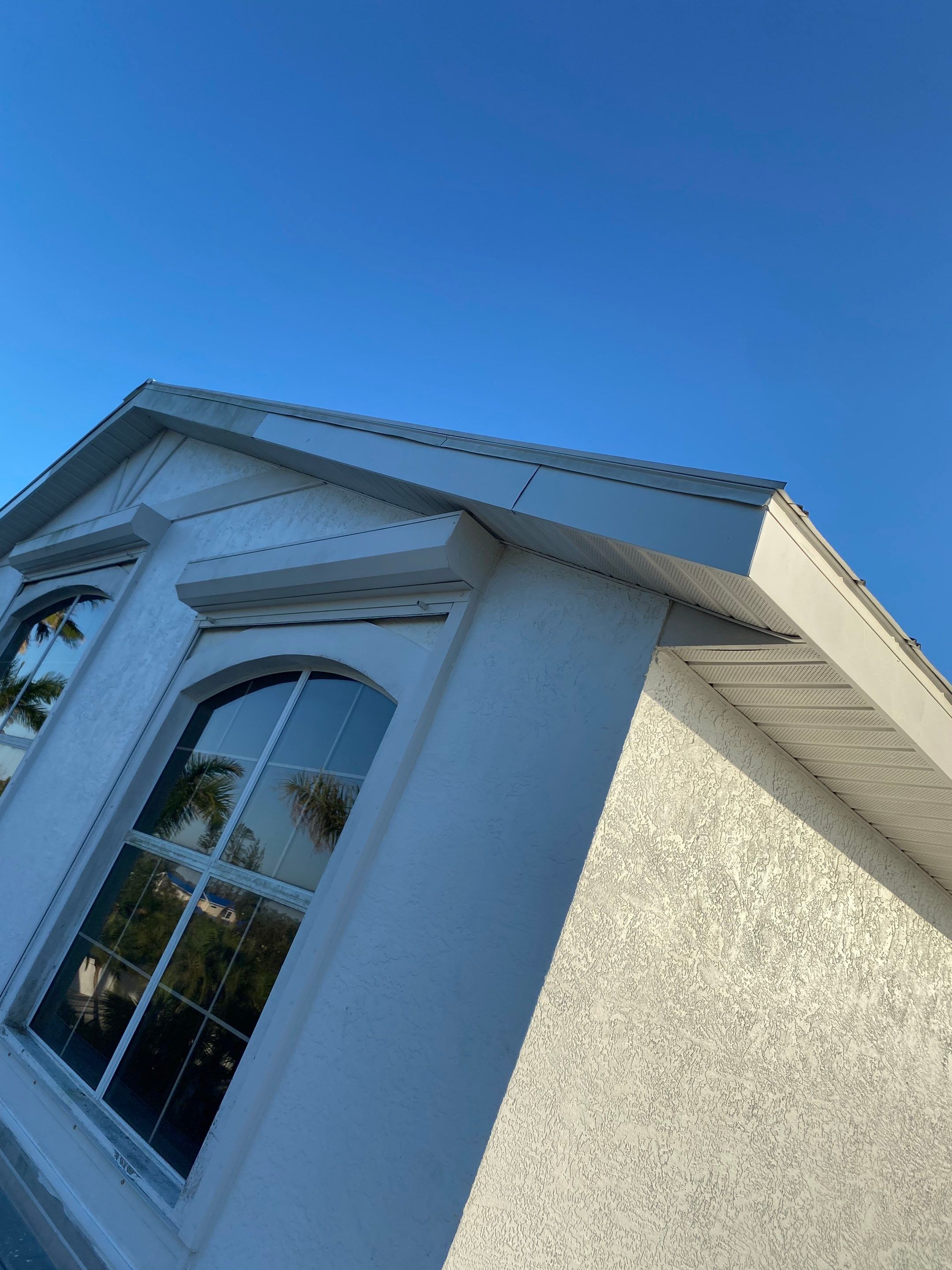 Seamless Gutter Installation for Beach Homes in Sarasota FL by Gutter Professors