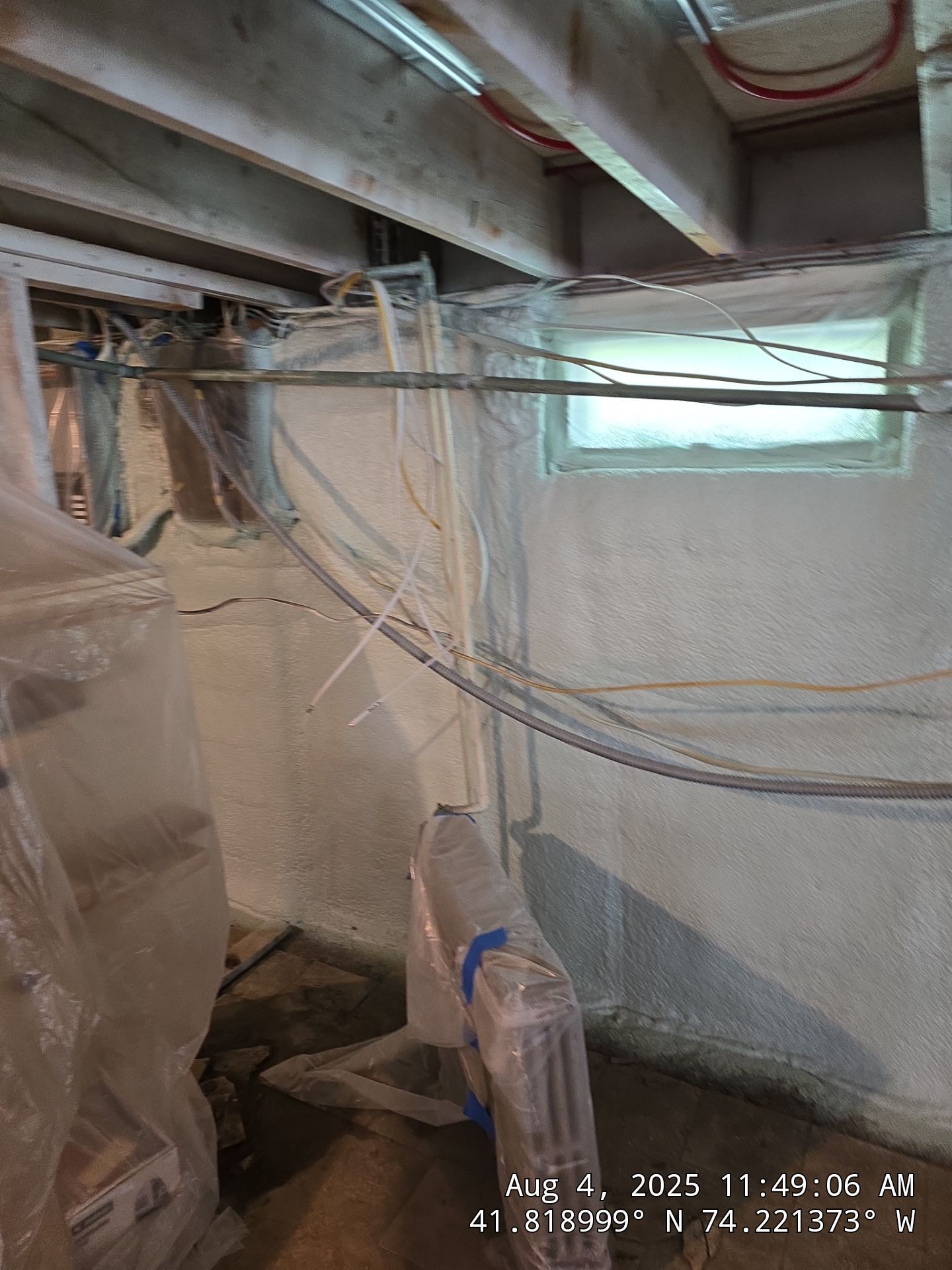 Master bedroom Exterior Walls using open cell spray foam by NYS Foam & Energy