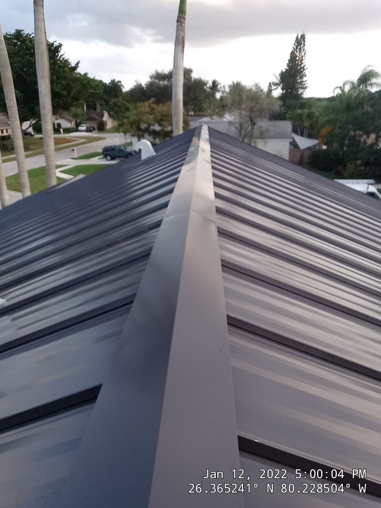 Residential Roofing Installation using 1" Nail strip metal roof by BLUES BROTHERS CONSTRUCTION CORP