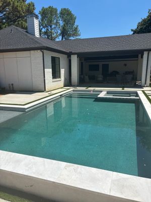 Modern Geometric Pool with Integrated Spa and Turf-Inlaid Decking