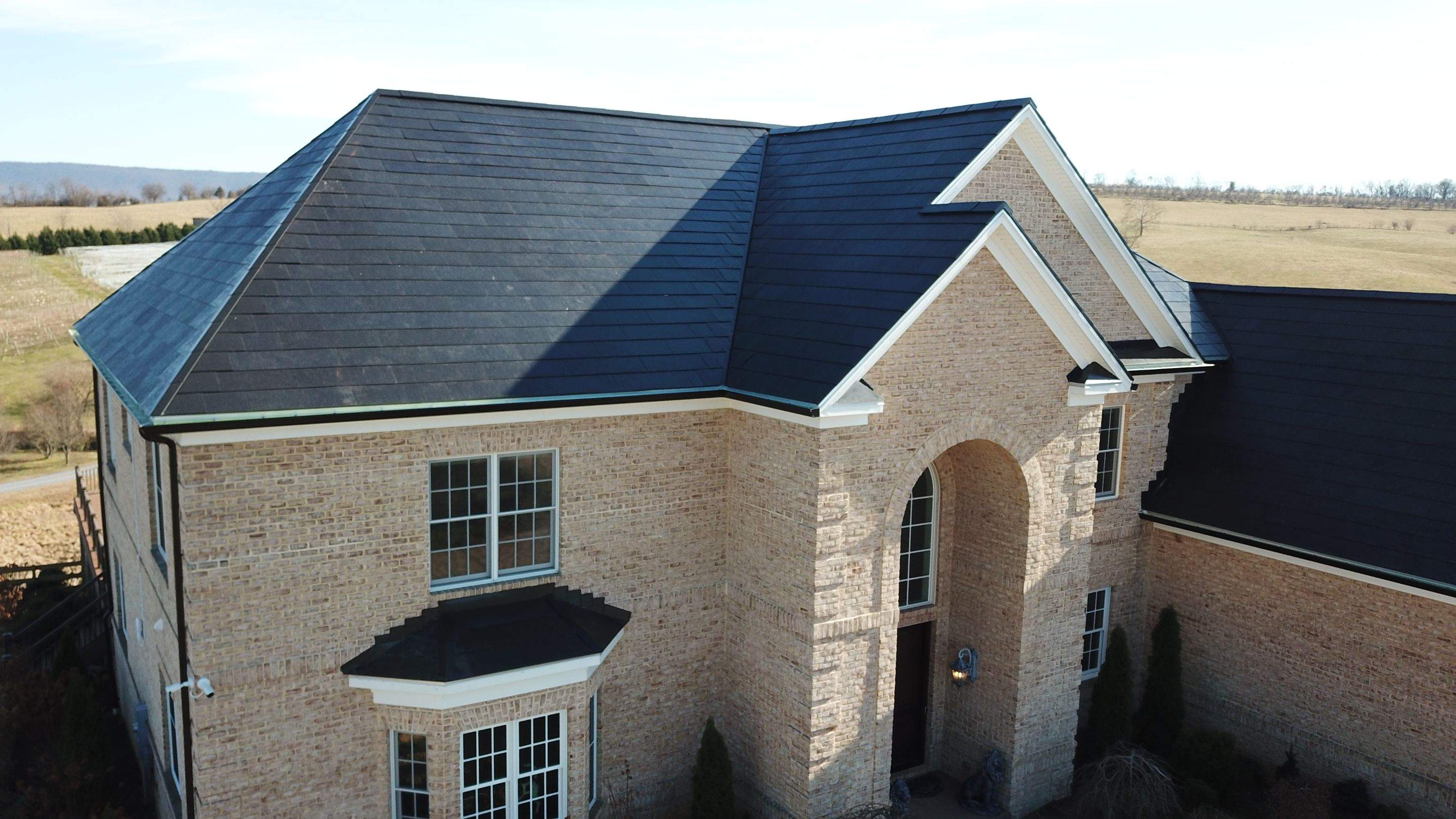 Tesla Solar Roof Replacement  by American Home Contractors