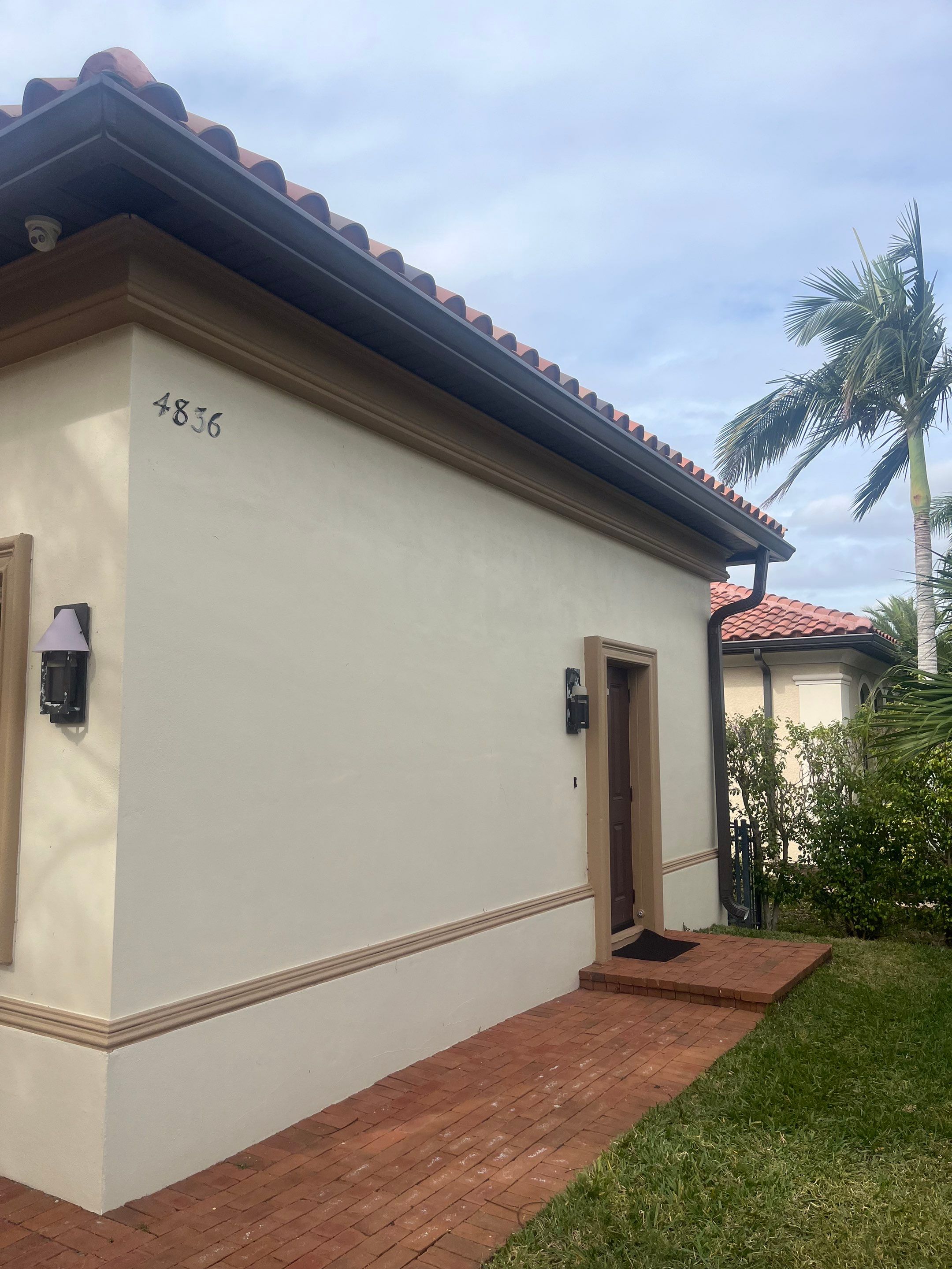 Musket Brown Seamless Gutters using Musket Brown Seamless Gutters in Cape Coral FL by Gutter Professors