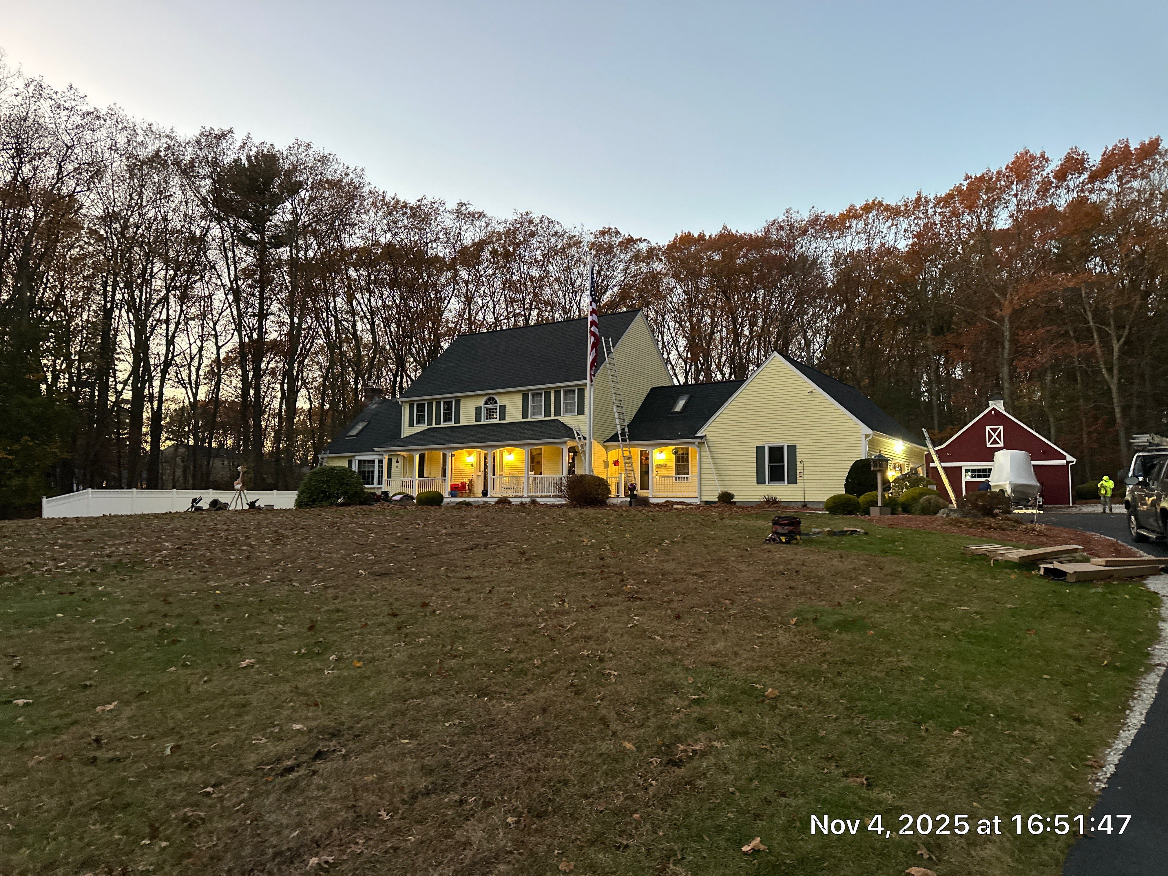 Chelmsford Premium Roof: Onyx Black Shingles with Standing Seam Metal Porch by Mighty Dog Roofing of Greater Middlesex County