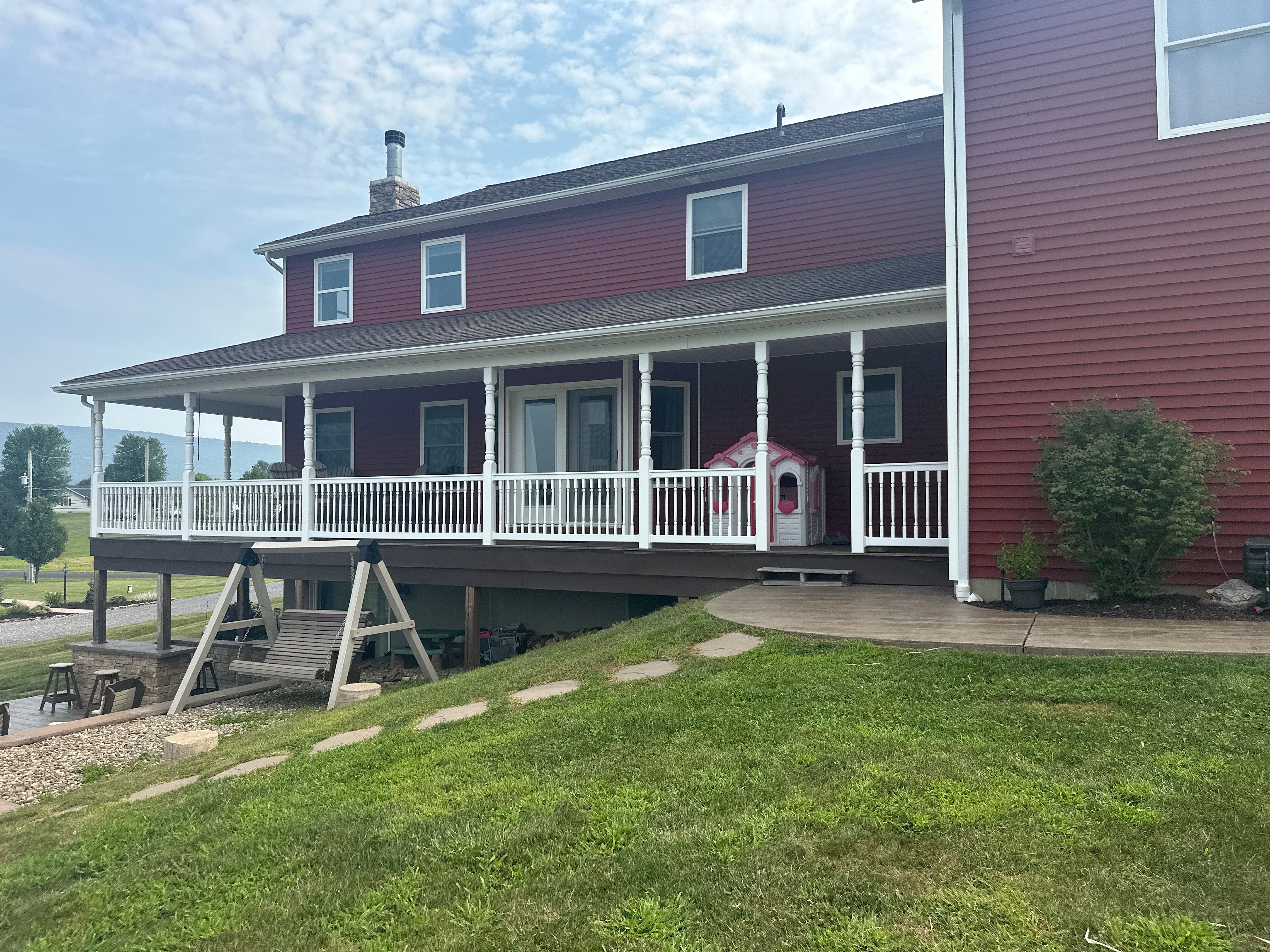 Covered Deck Addition With Custom Gable Roof in Tower City by Esh Builders