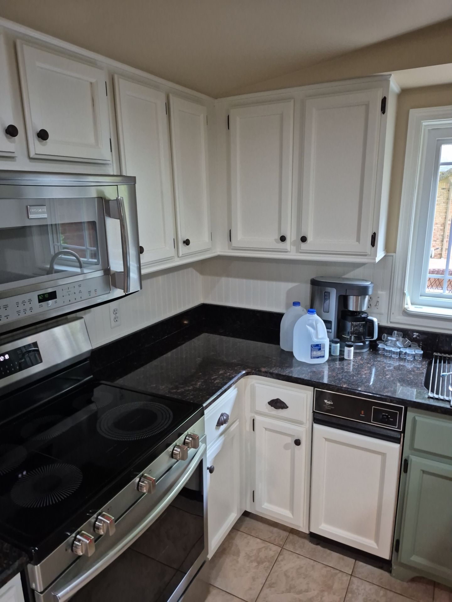 Kitchen Cabinet Refinishing Upgrade in Shelby Township by Top Shelf Painter